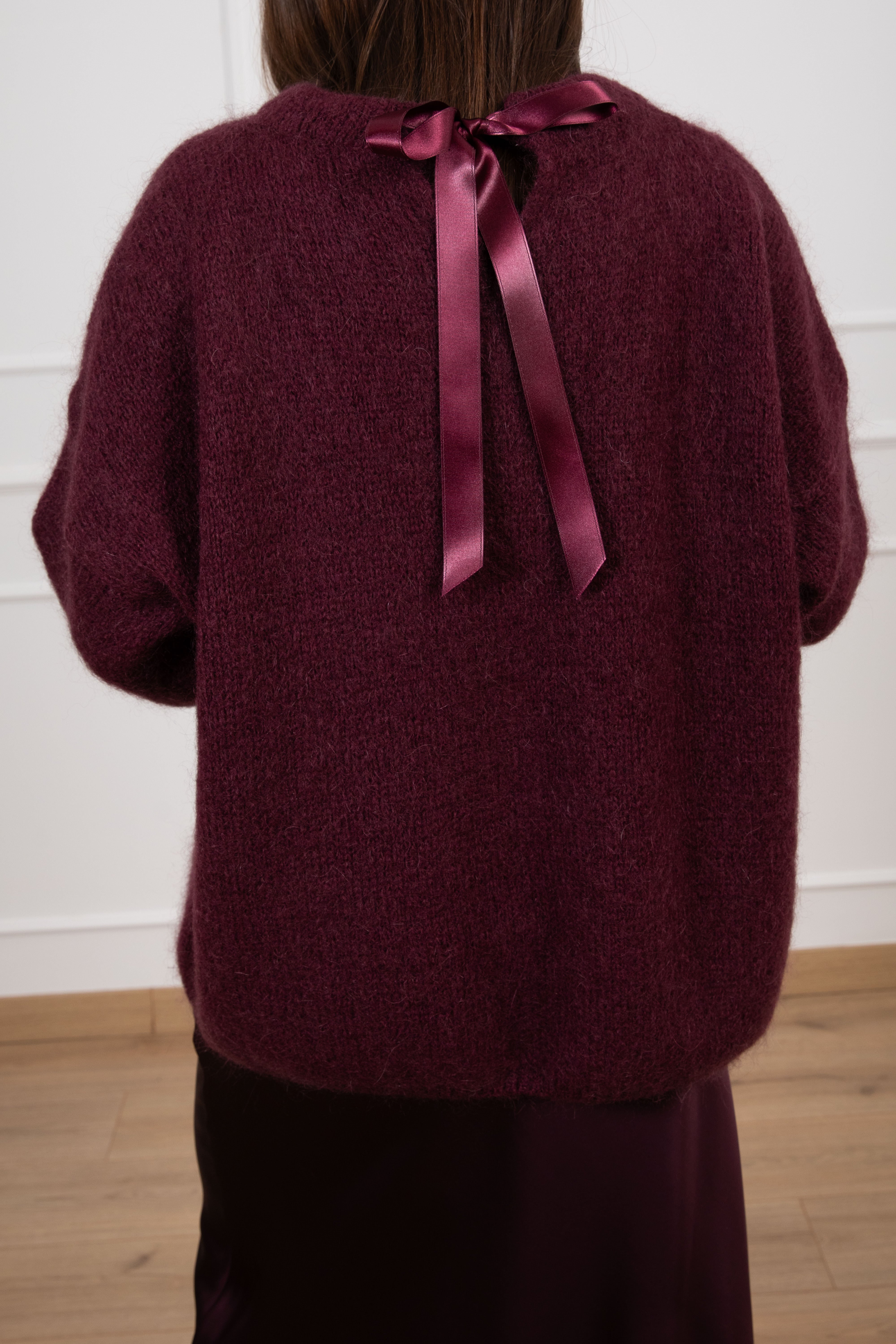 Pull in mohair con tasca e fiocco Dixie