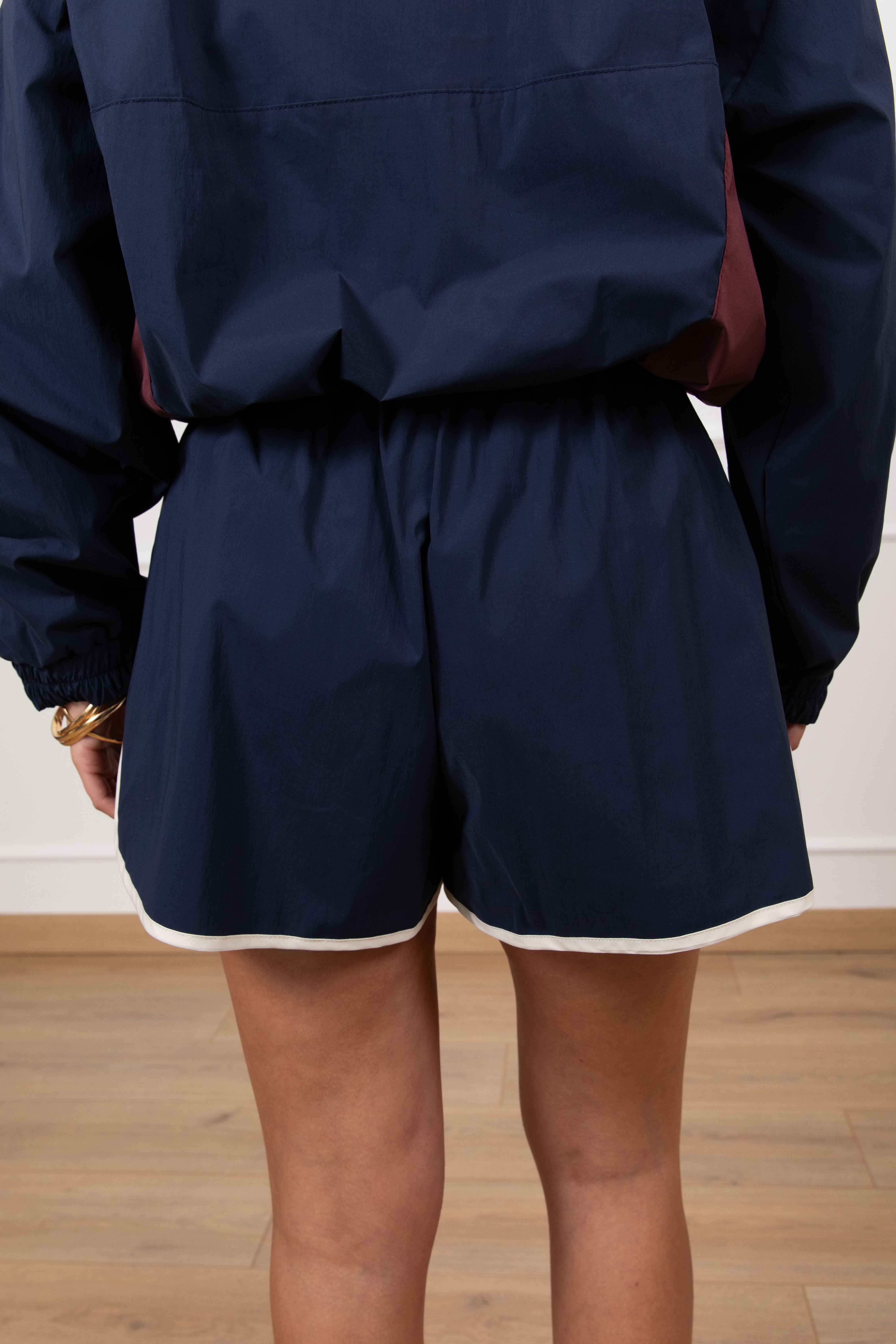 Shorts con bande bi-color Tensione IN