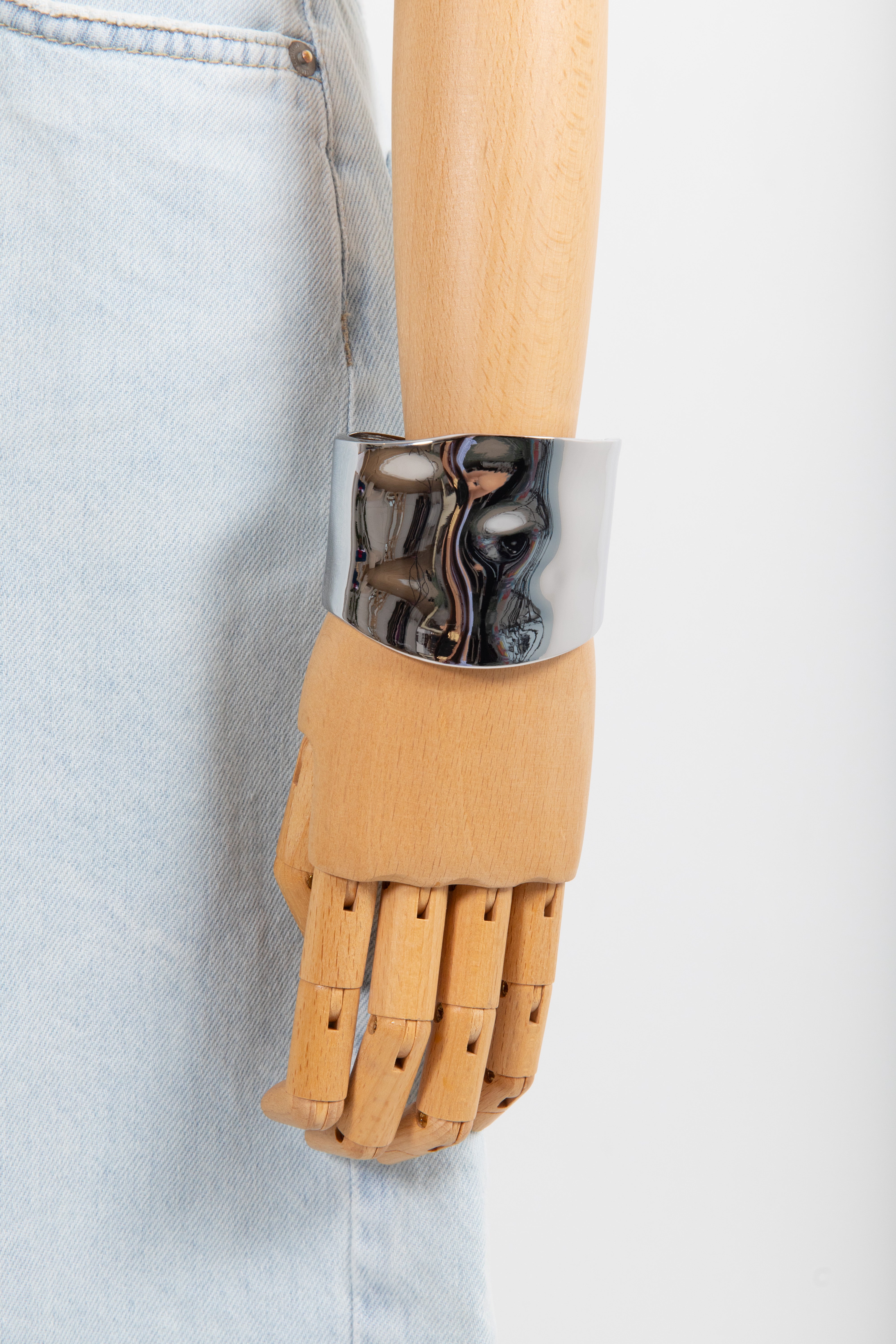 Bracciale lucido basso asimmetrico
