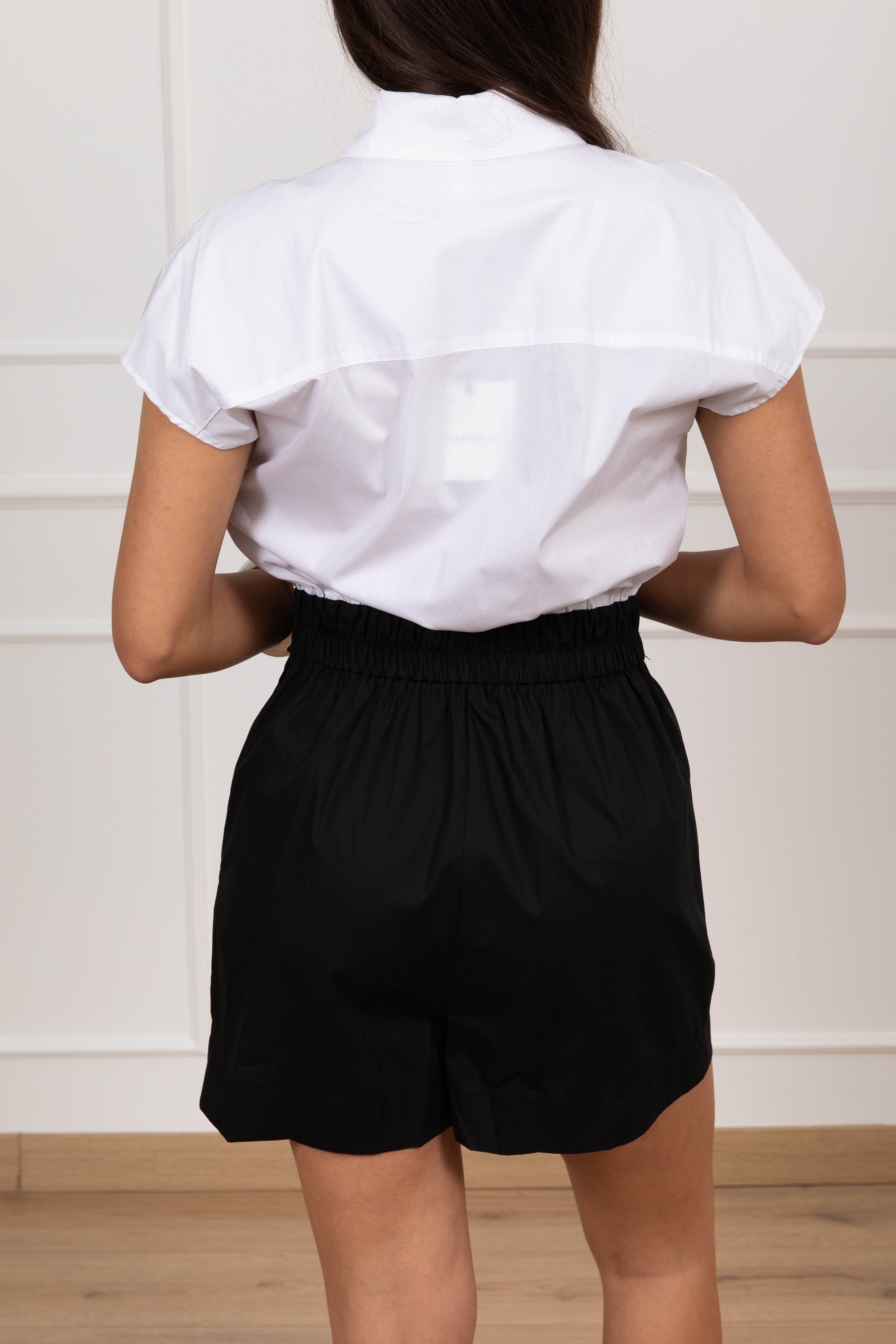 Jumpsuit corta bi-color con applicazione gioiello Tensione IN