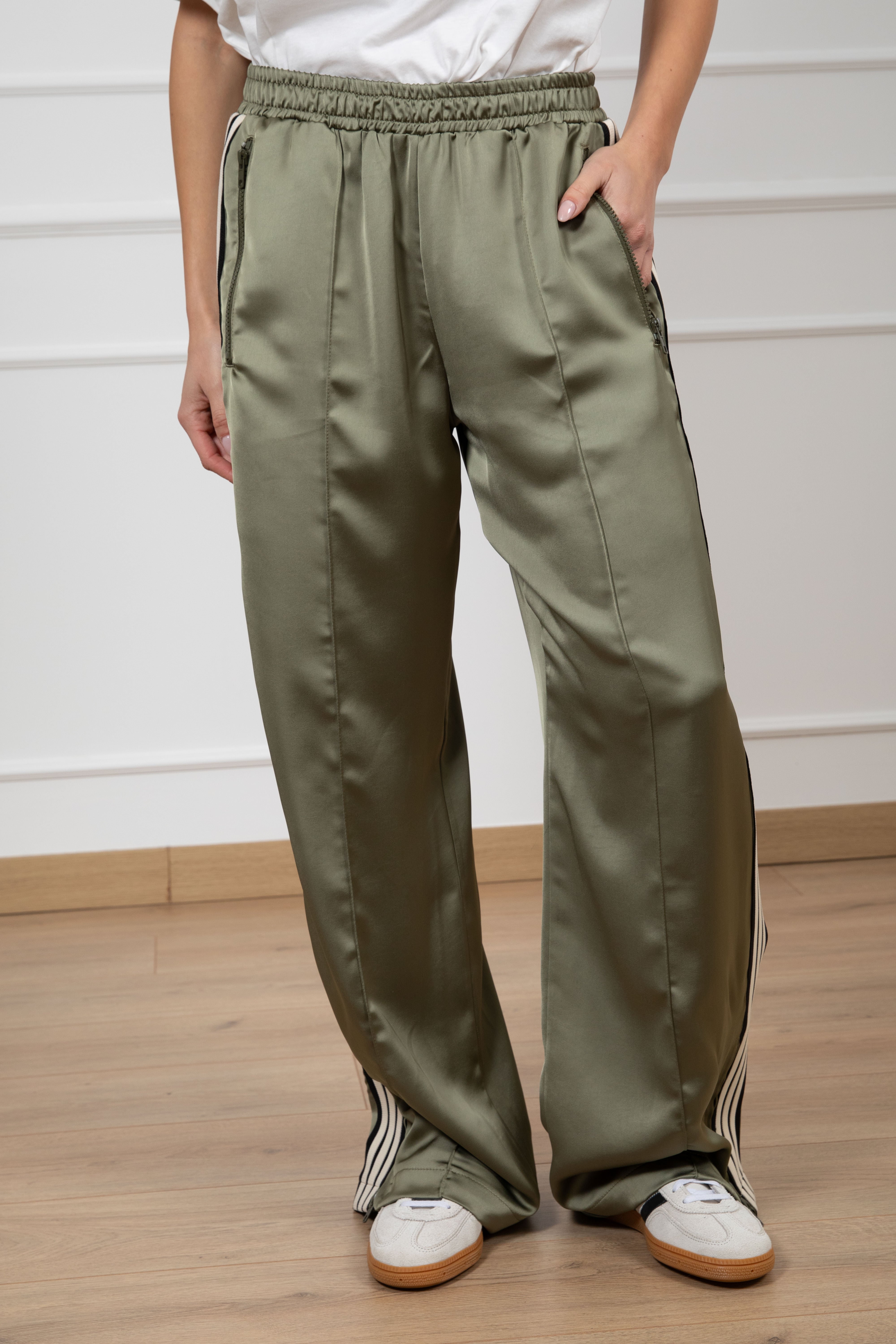 Pantalone lucido con banda laterale Tensione IN