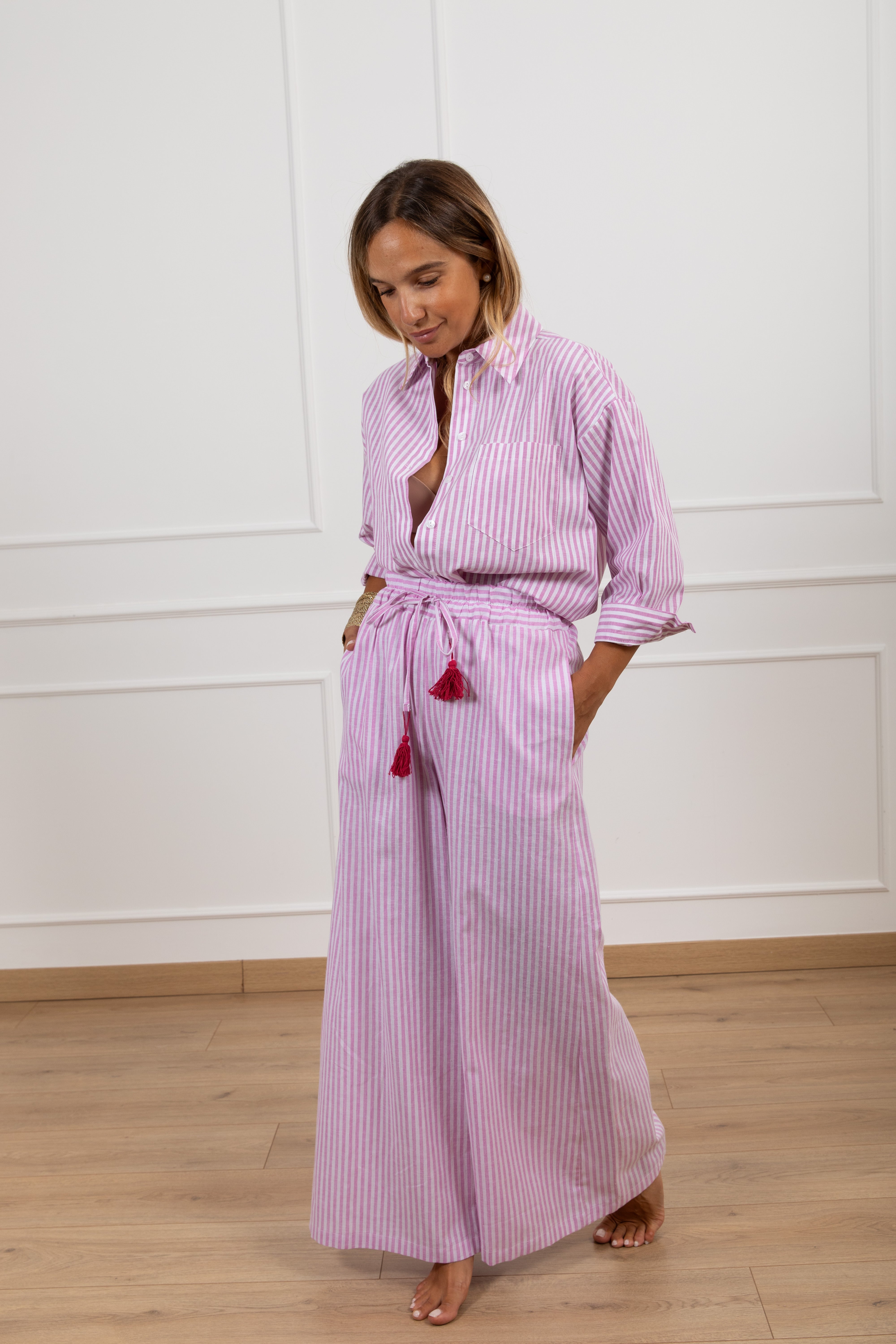 Pantalone "St. Tropez je t'aime" a righe con elastico e nappine Motel