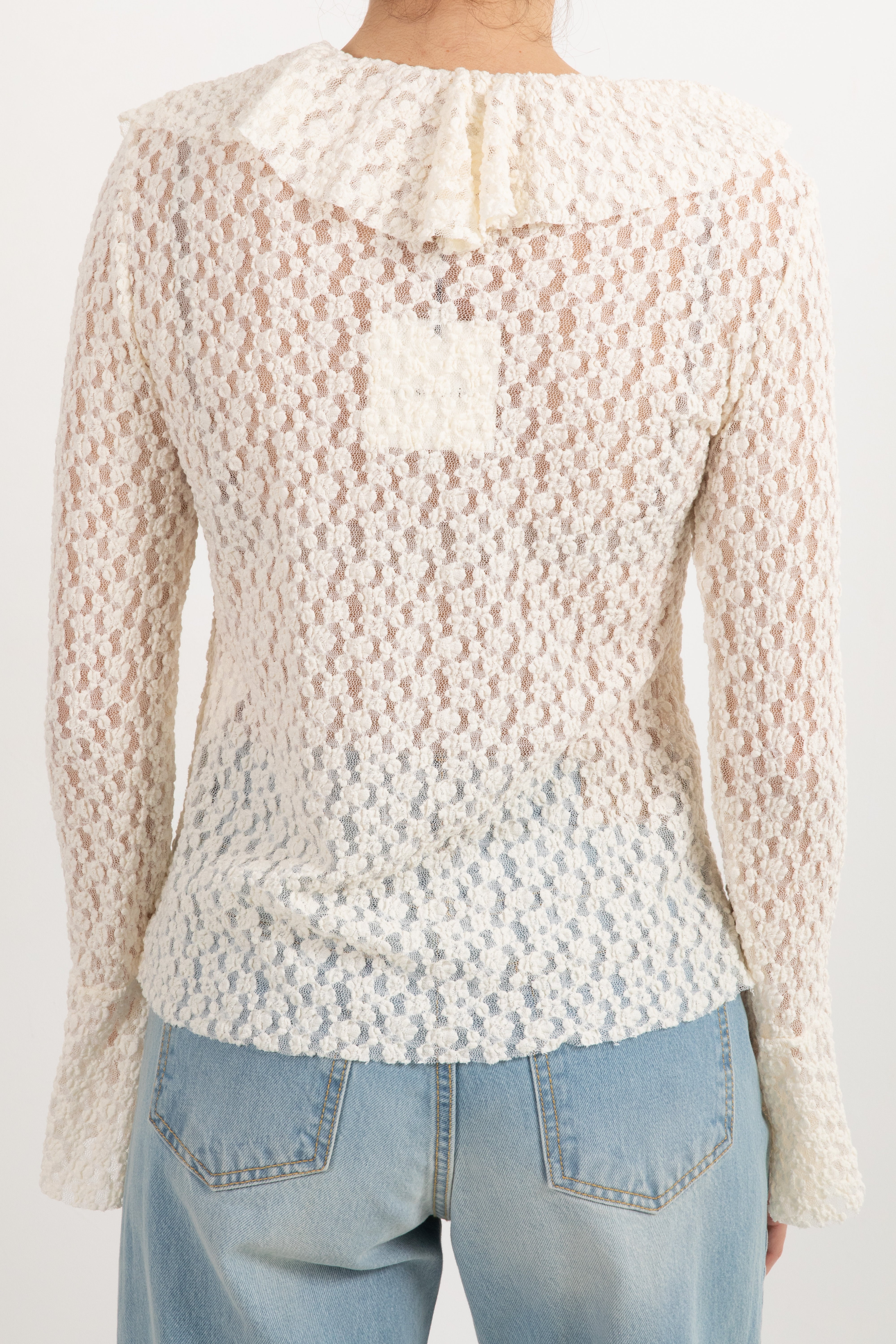 Blusa in pizzo goffrato con rouches Tensione In