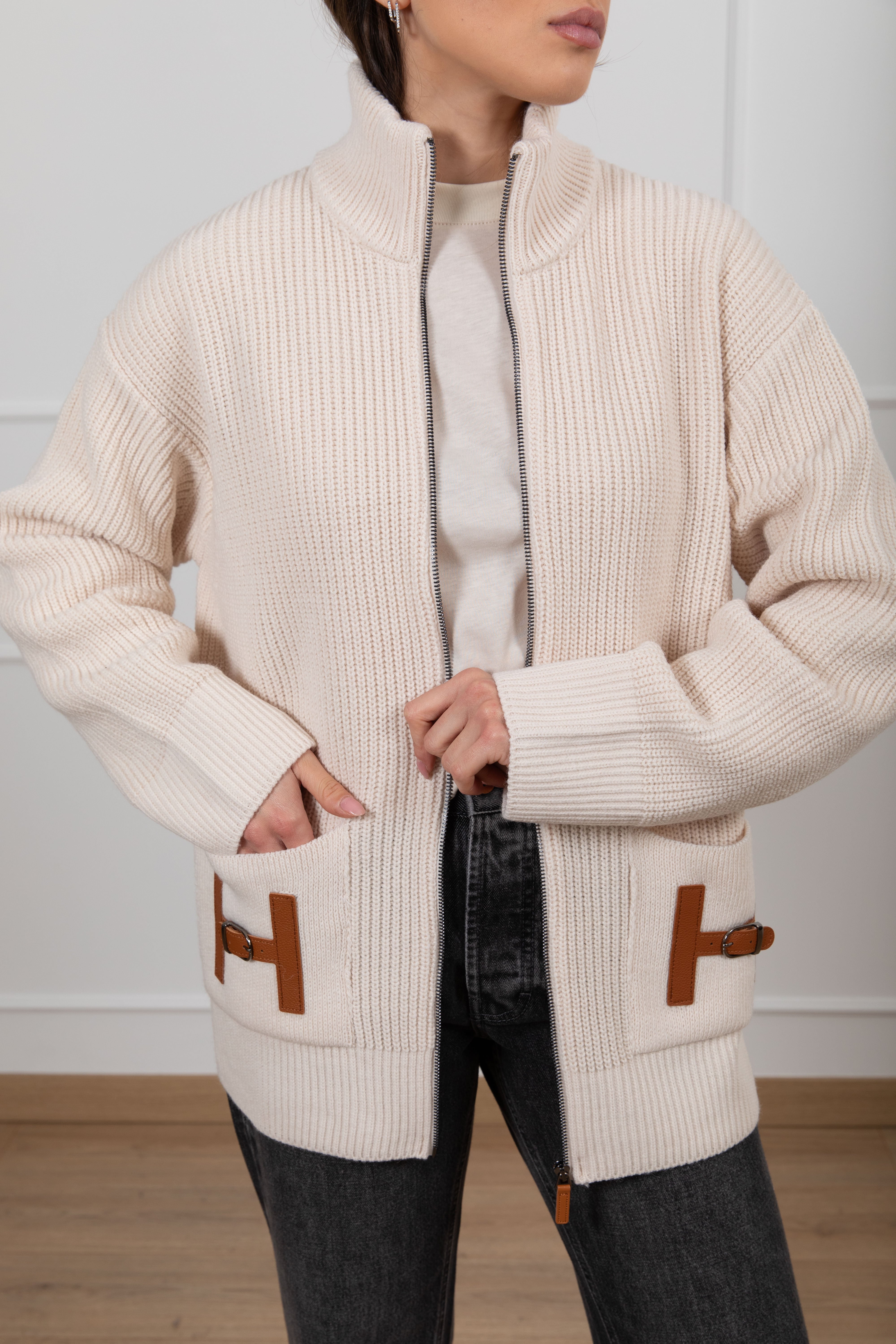 Pull con zip "H" in eco-pelle Tensione IN