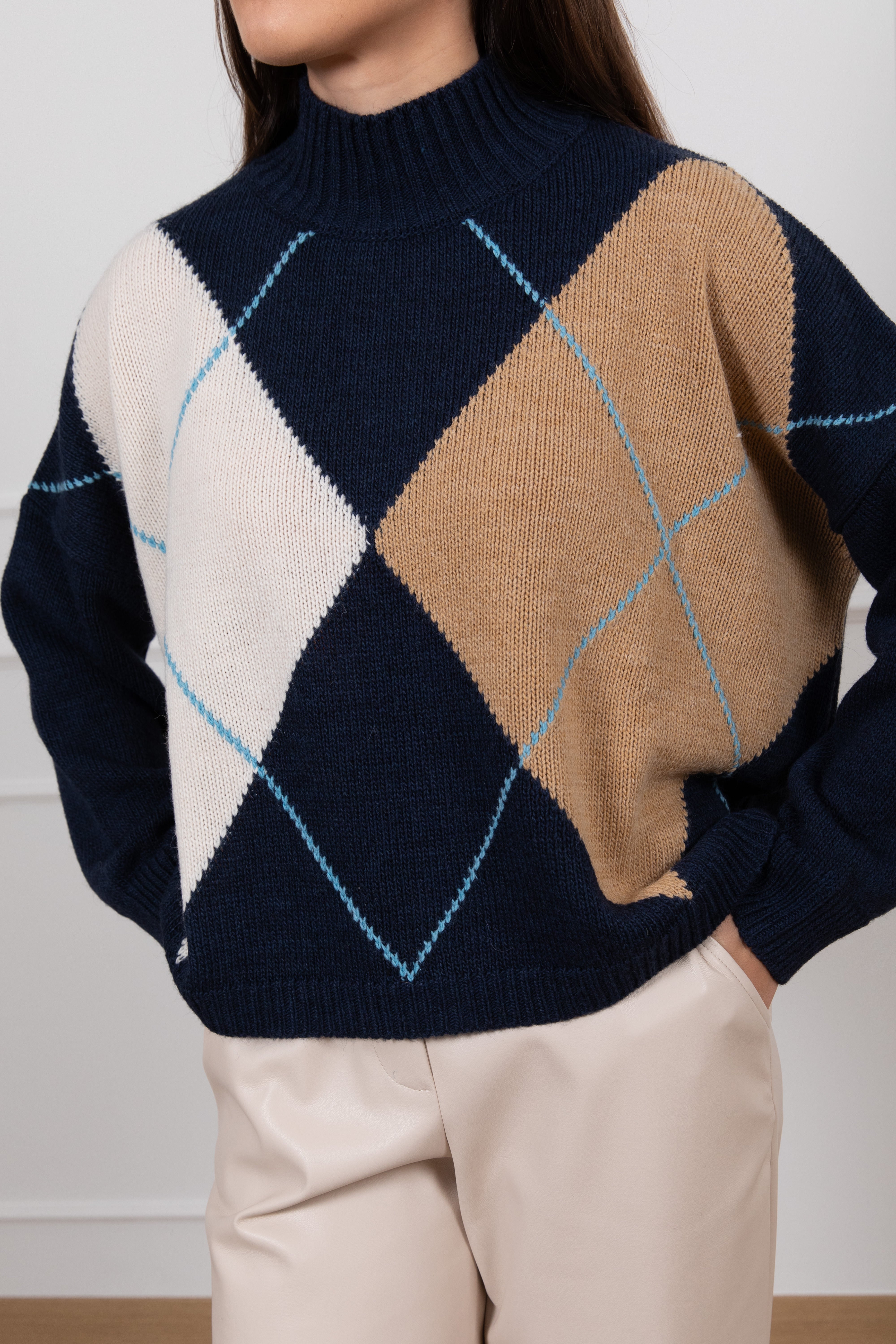 Pull rombi con mezzo collo Tensione IN