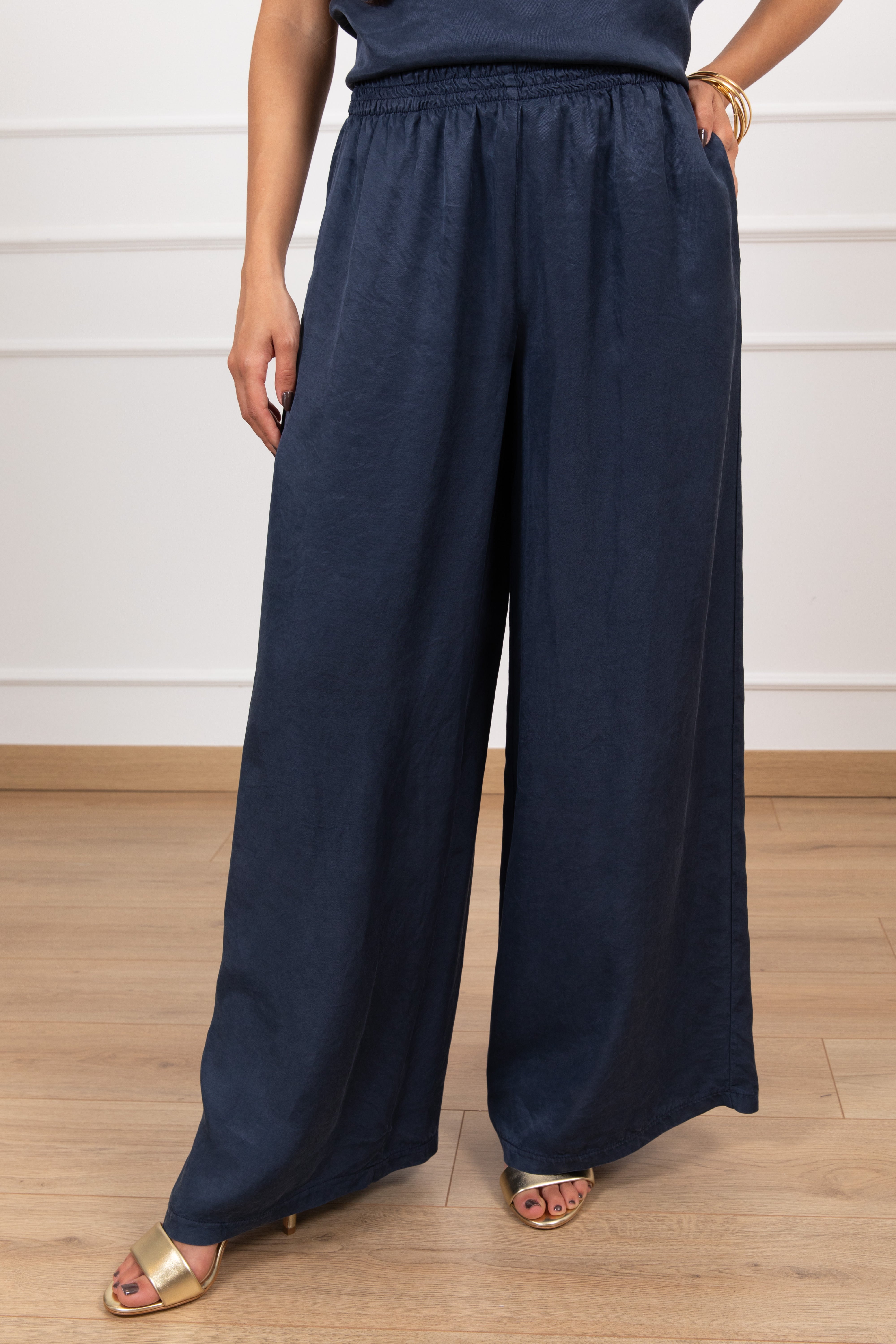 Pantalone gamba larga in cupro con elastico Tensione IN