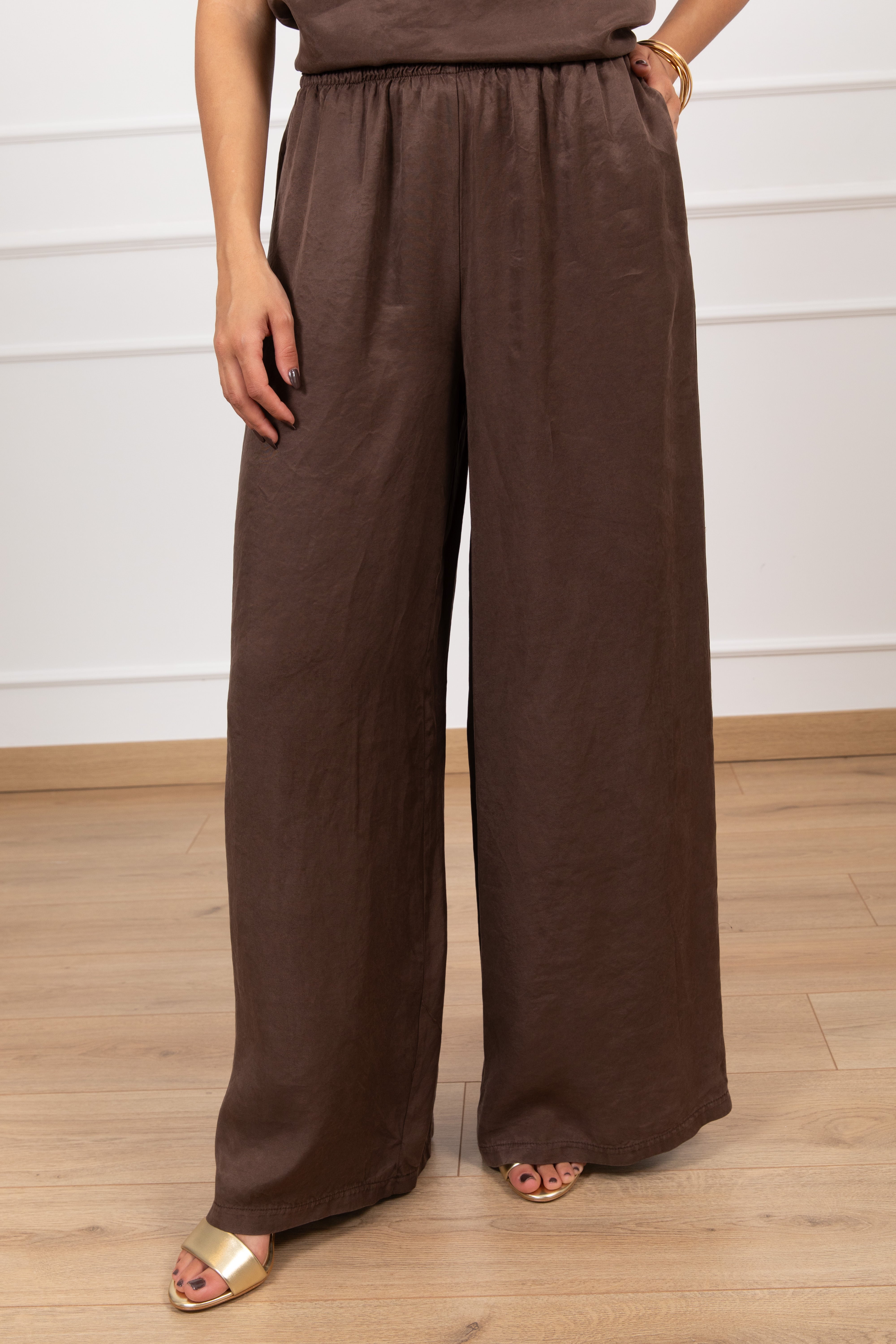 Pantalone gamba larga in cupro con elastico Tensione IN