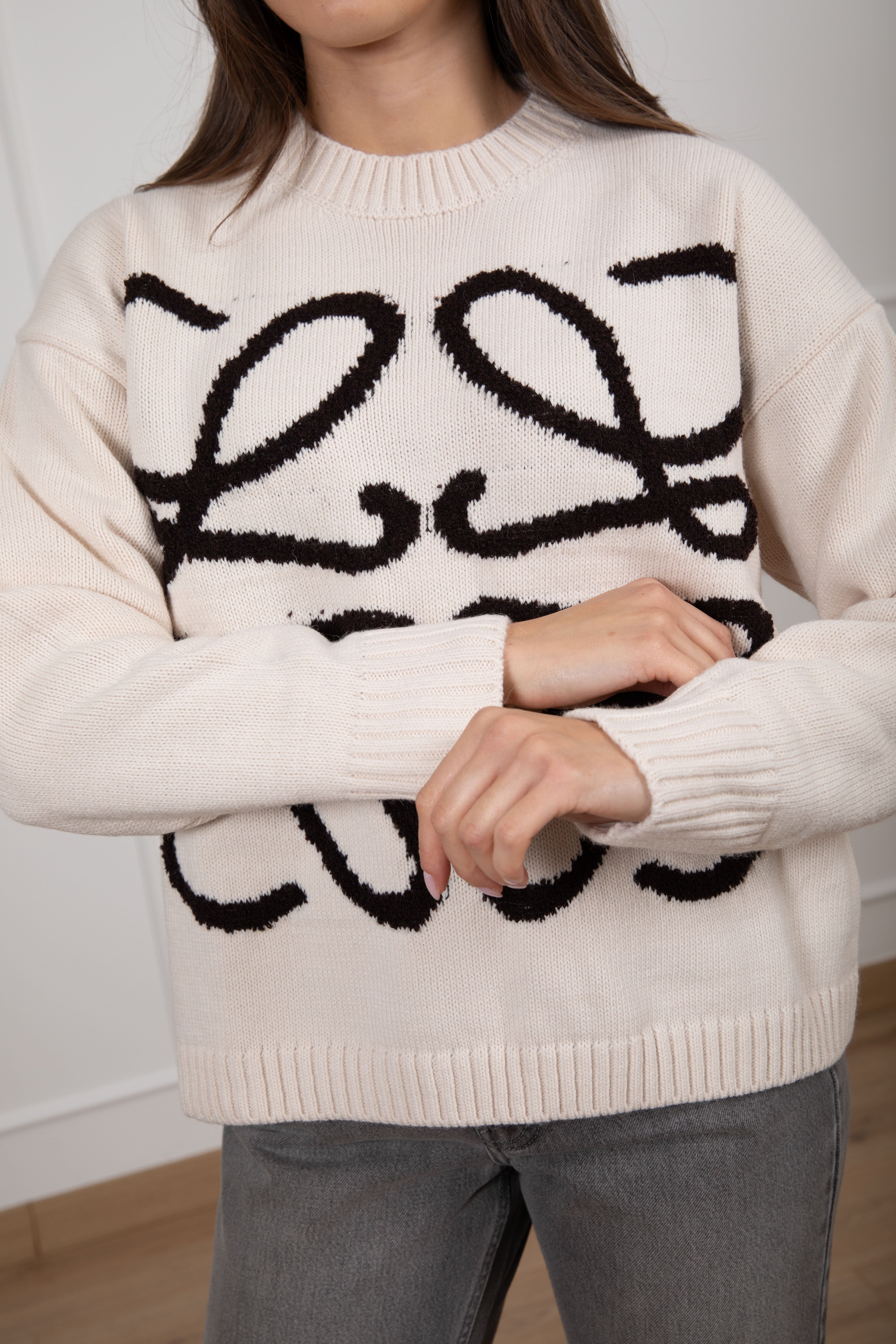 Pull con ricamo incrociato Motel