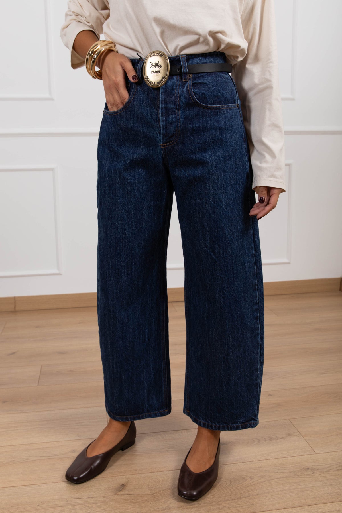 Jeans lavaggio blu con cintura placca Tensione IN