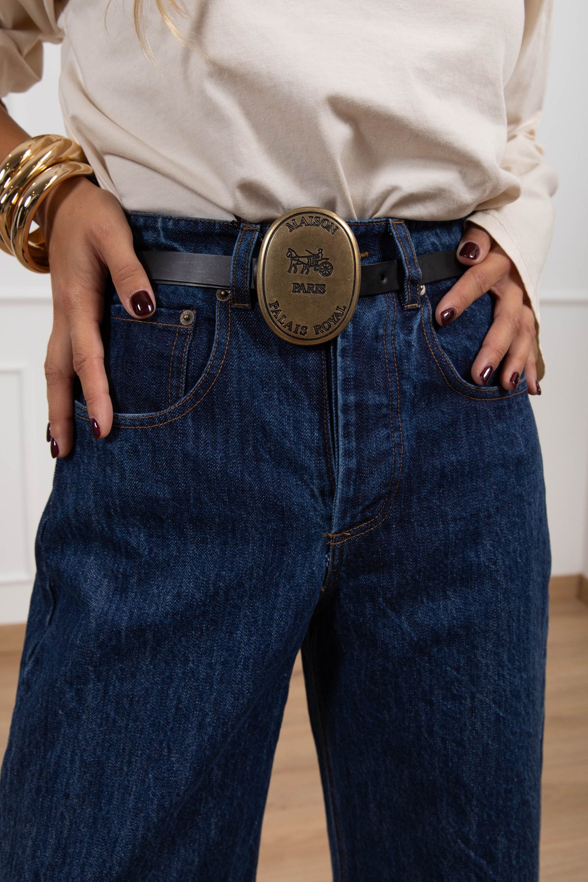 Jeans lavaggio blu con cintura placca Tensione IN