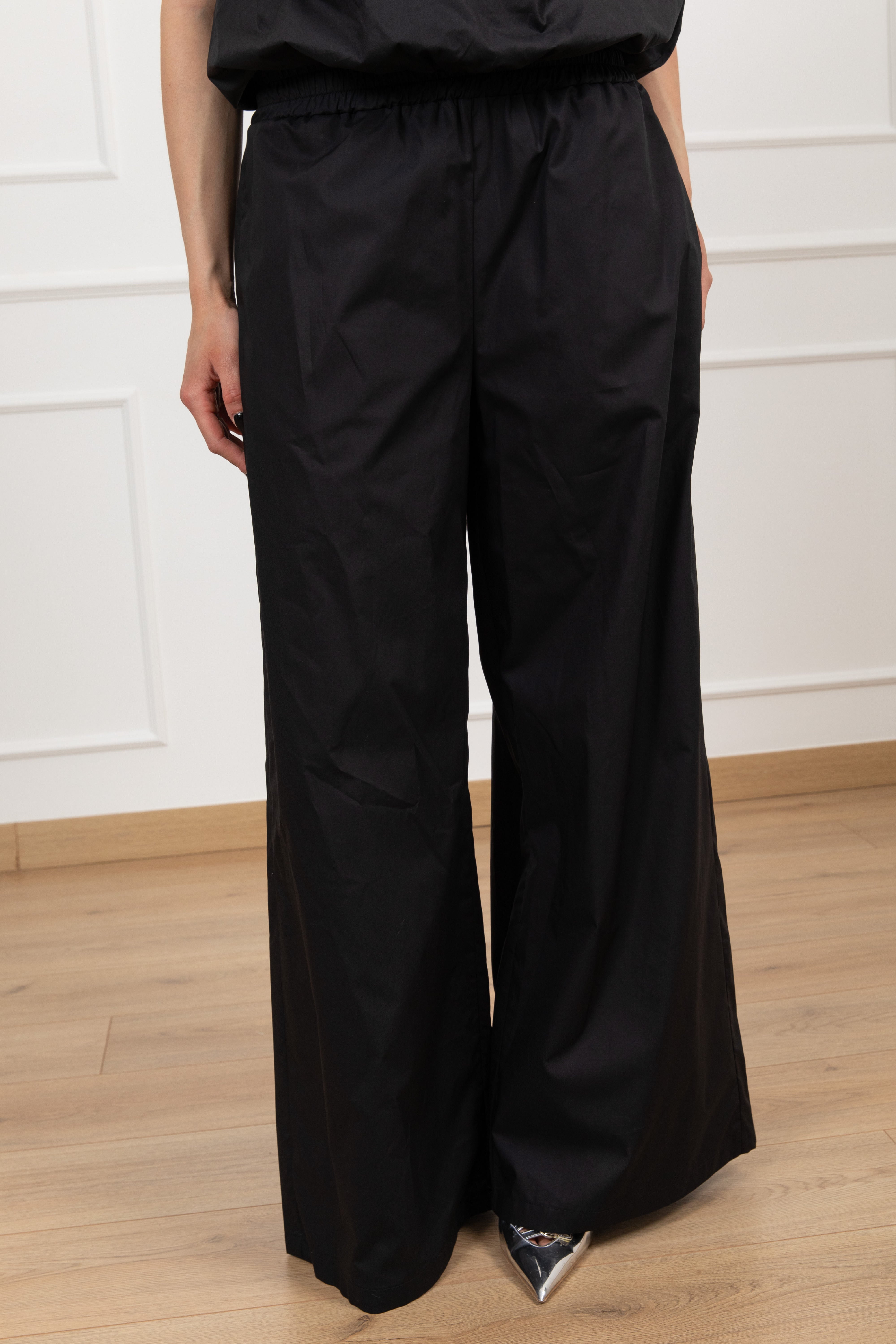 Pantalone gamba larga con tasca paillettes e elastico Motel