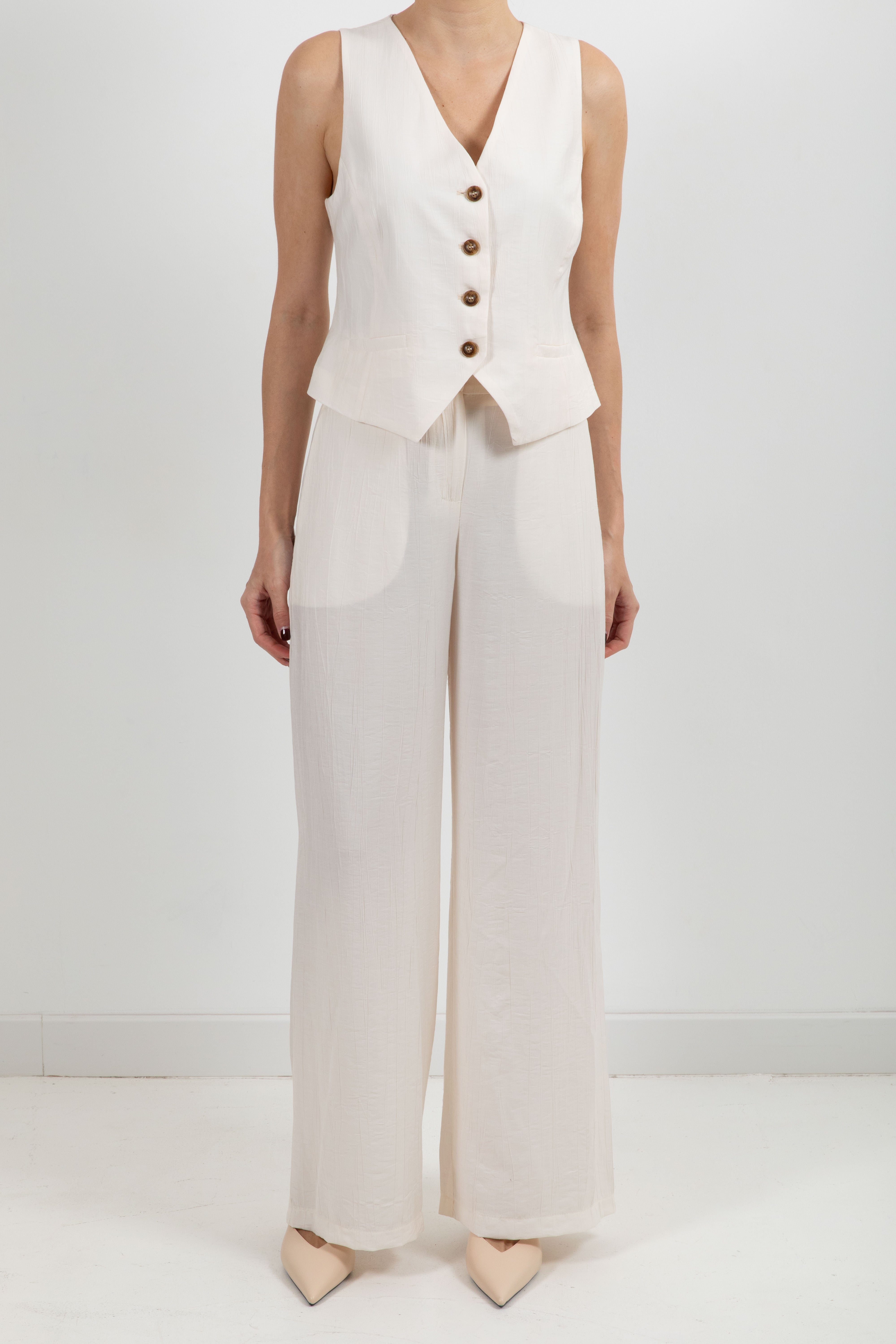 Tailleur in viscosa goffrata gilet e pantalone Tensione IN