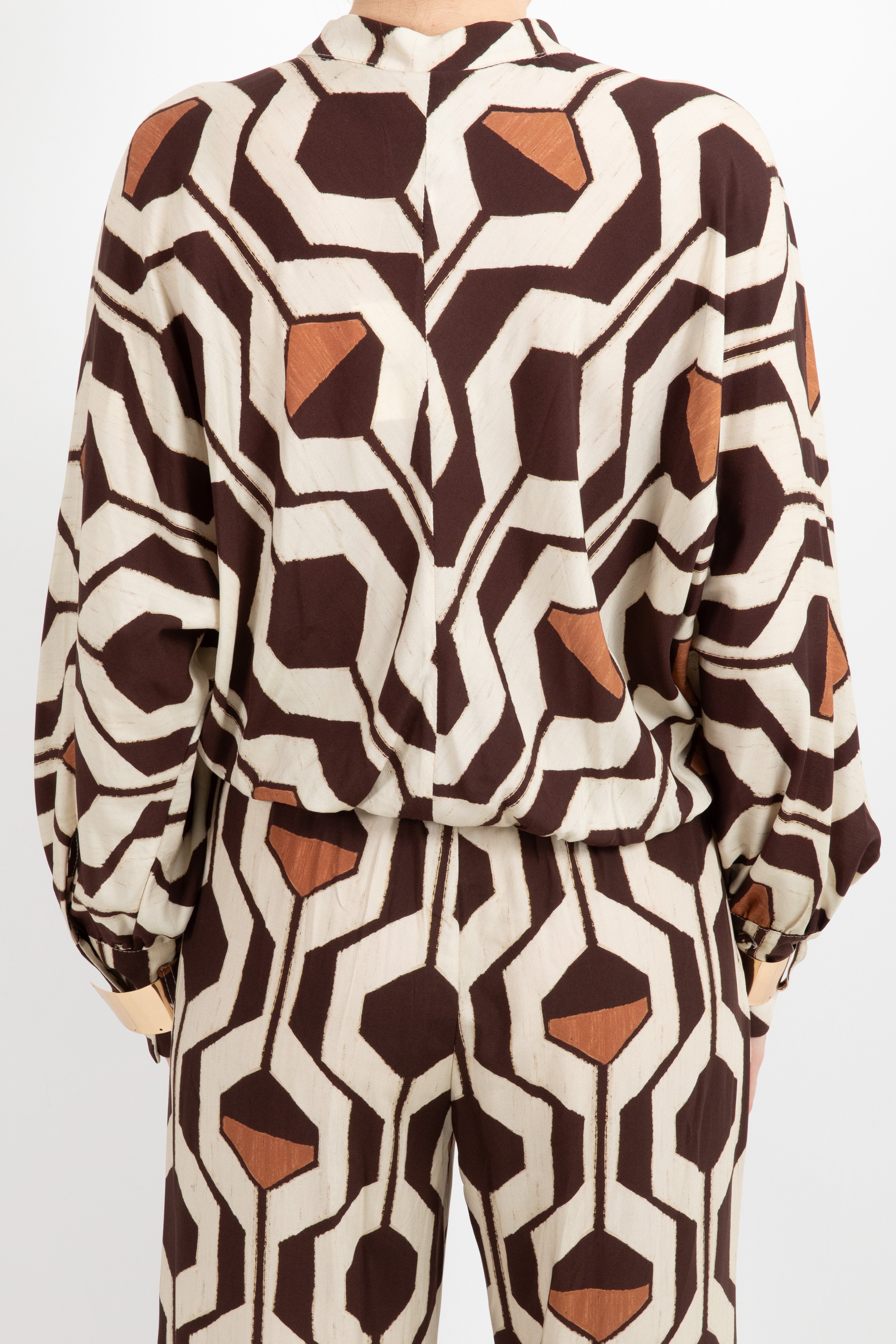 Camicia fantasia geometrica con bracciali oro Tensione IN