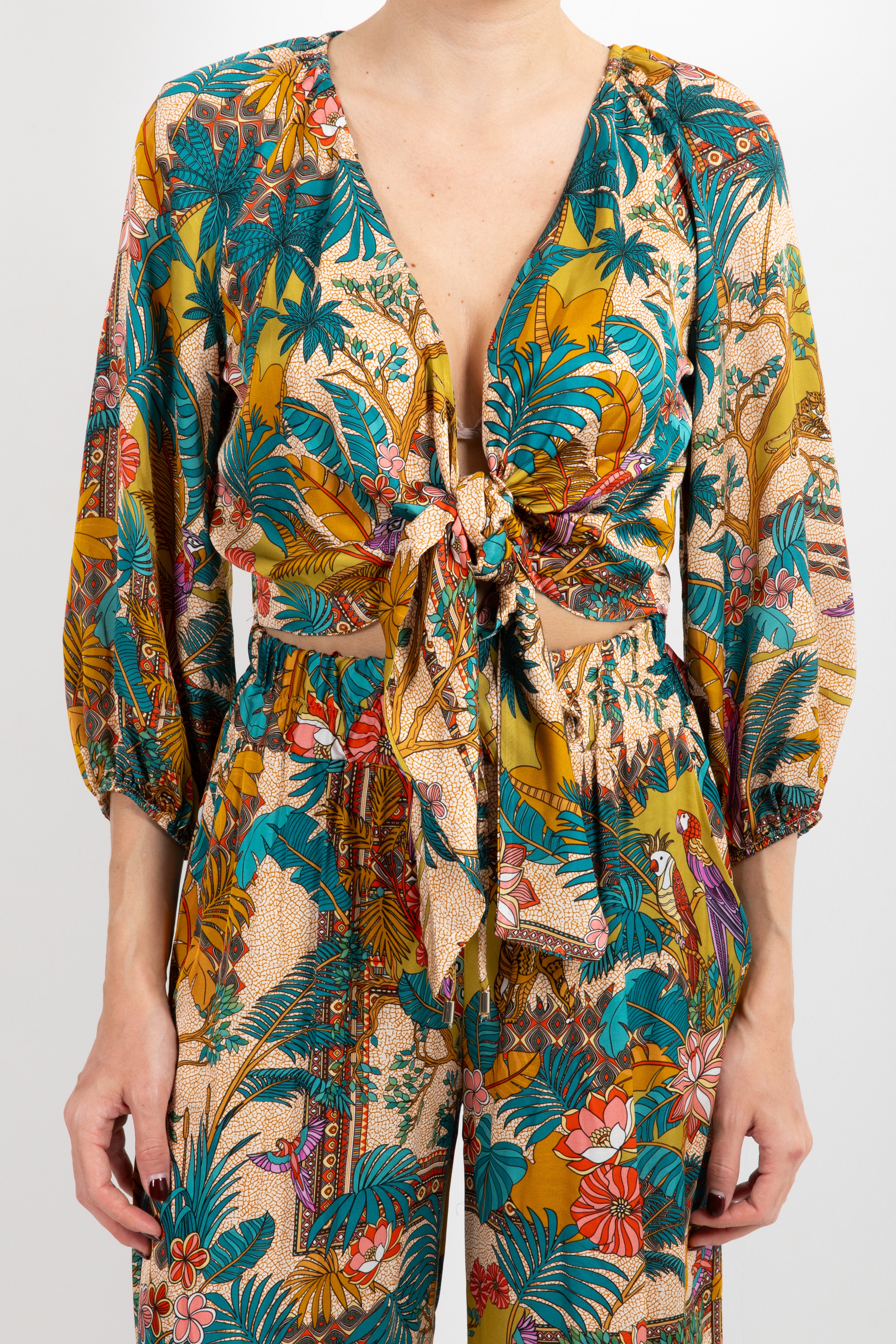 Blusa fantasia tribale con nodo Tensione IN