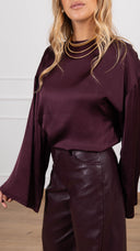 Blusa in viscosa manica svasata variante bordeaux Tensione IN