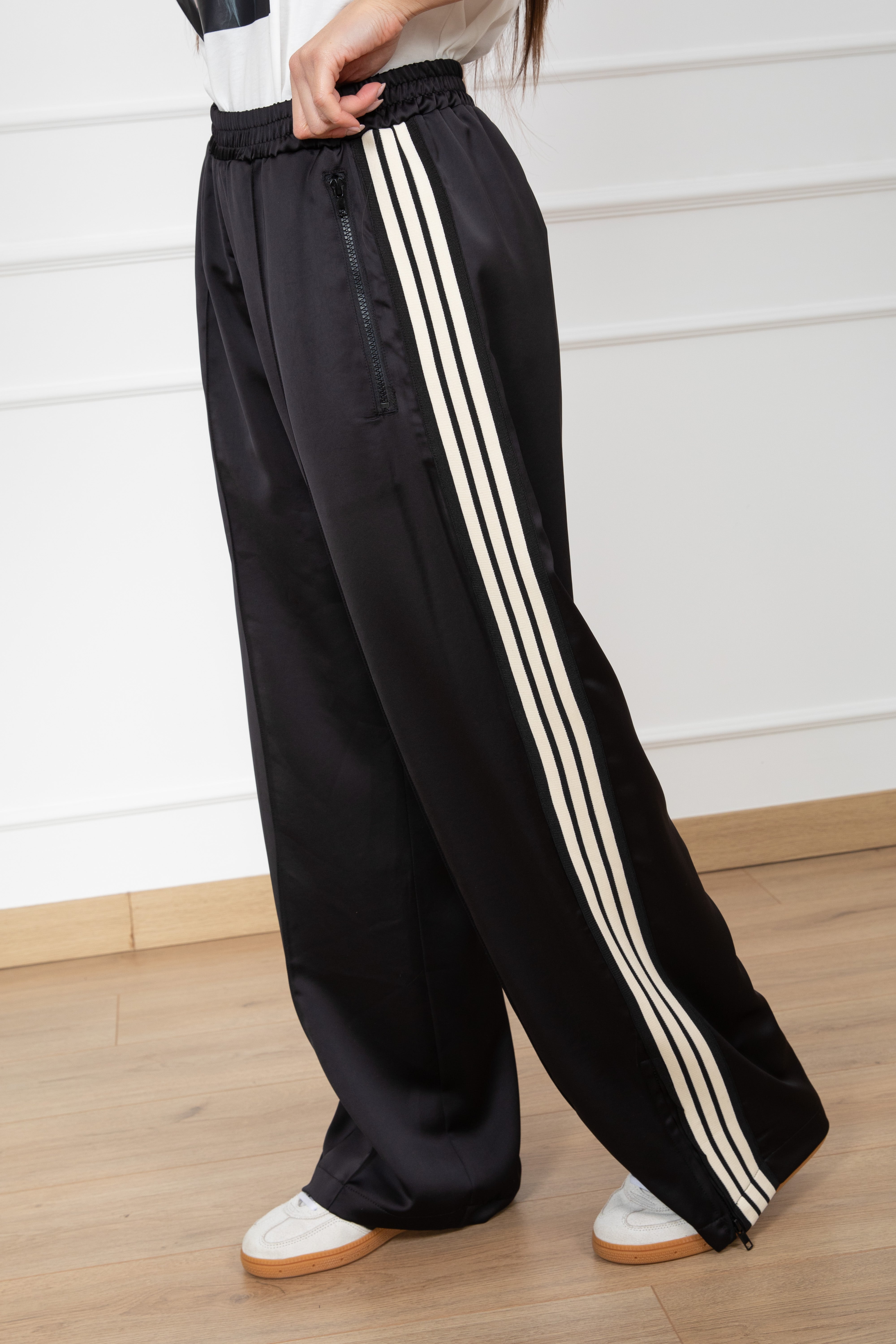 Pantalone lucido con banda laterale Tensione IN