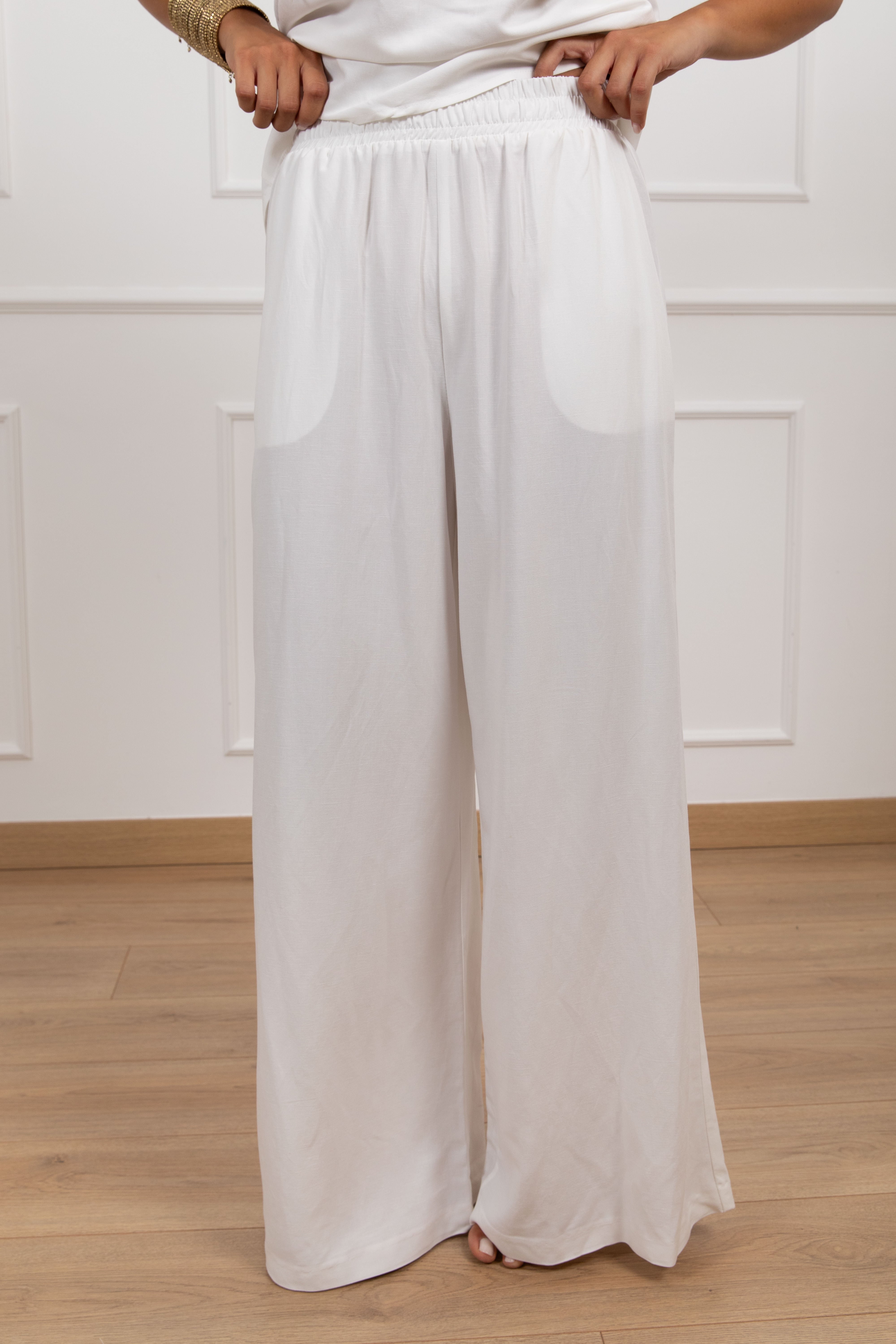 Coordinato top asimmetrico e pantalone gamba dritta Motel