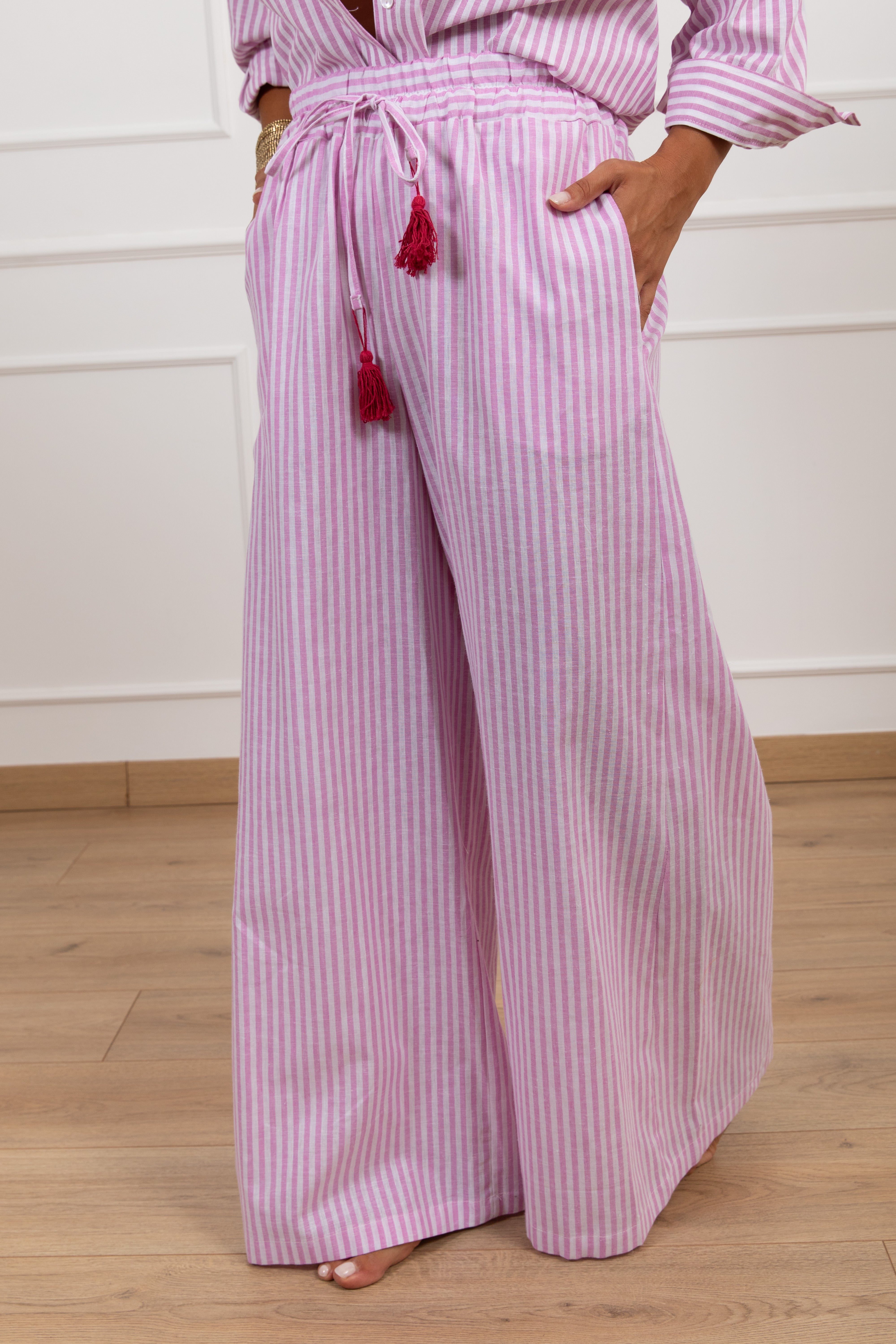 Pantalone "St. Tropez je t'aime" a righe con elastico e nappine Motel