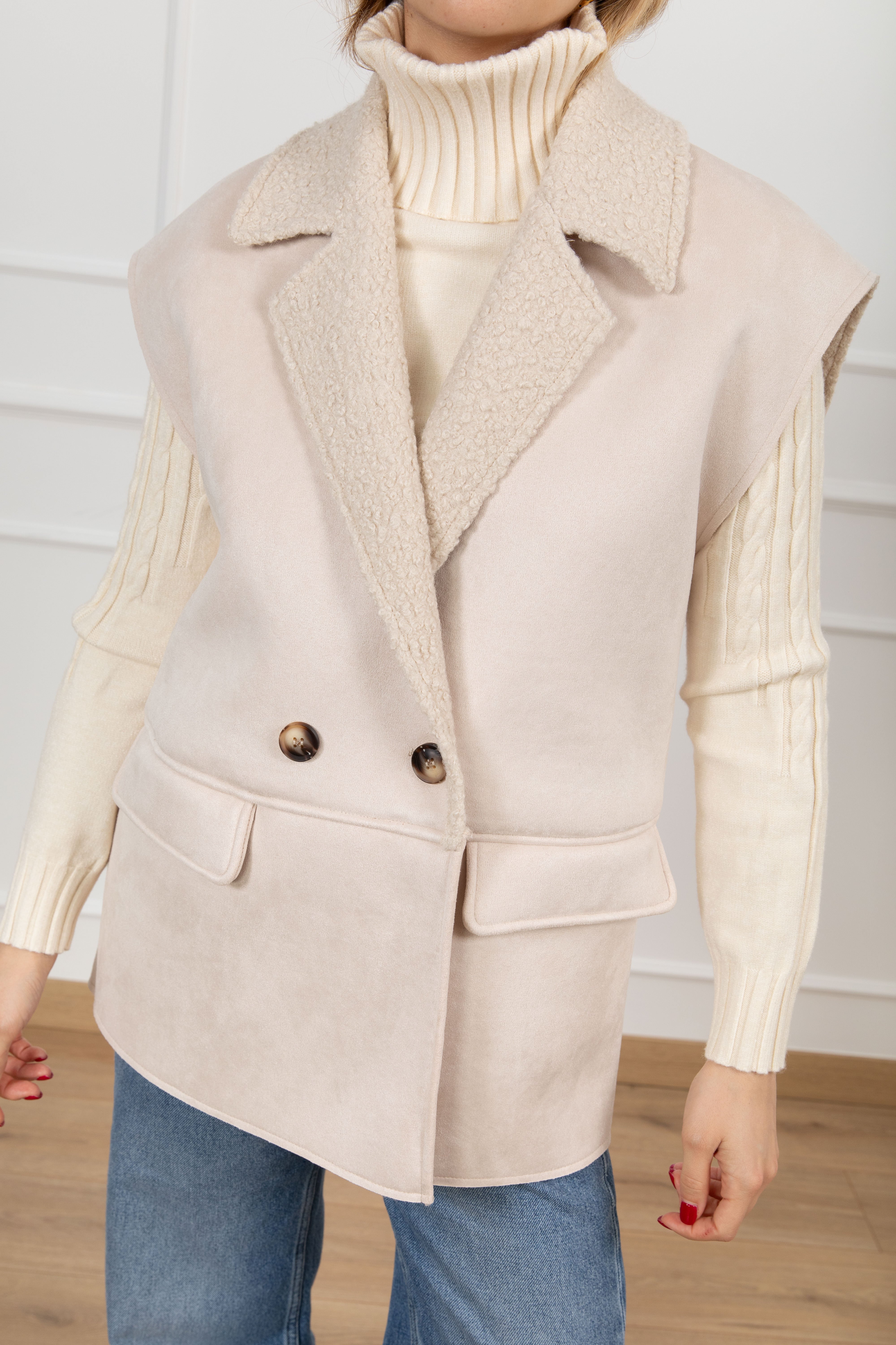 Eco-montone smanicato Tensione IN