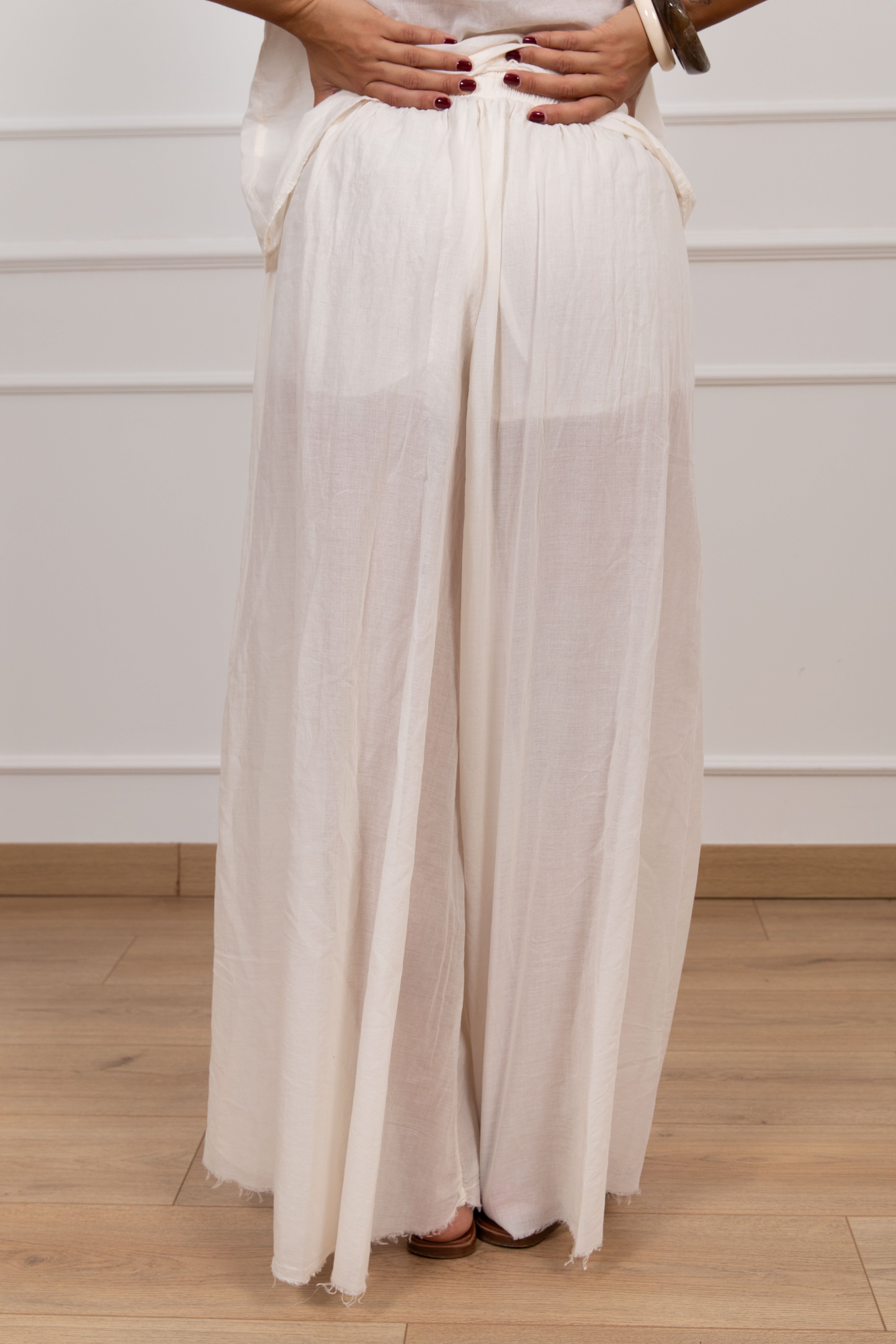 Pantalone gamba ampia con fondo sfrangiato Tensione IN