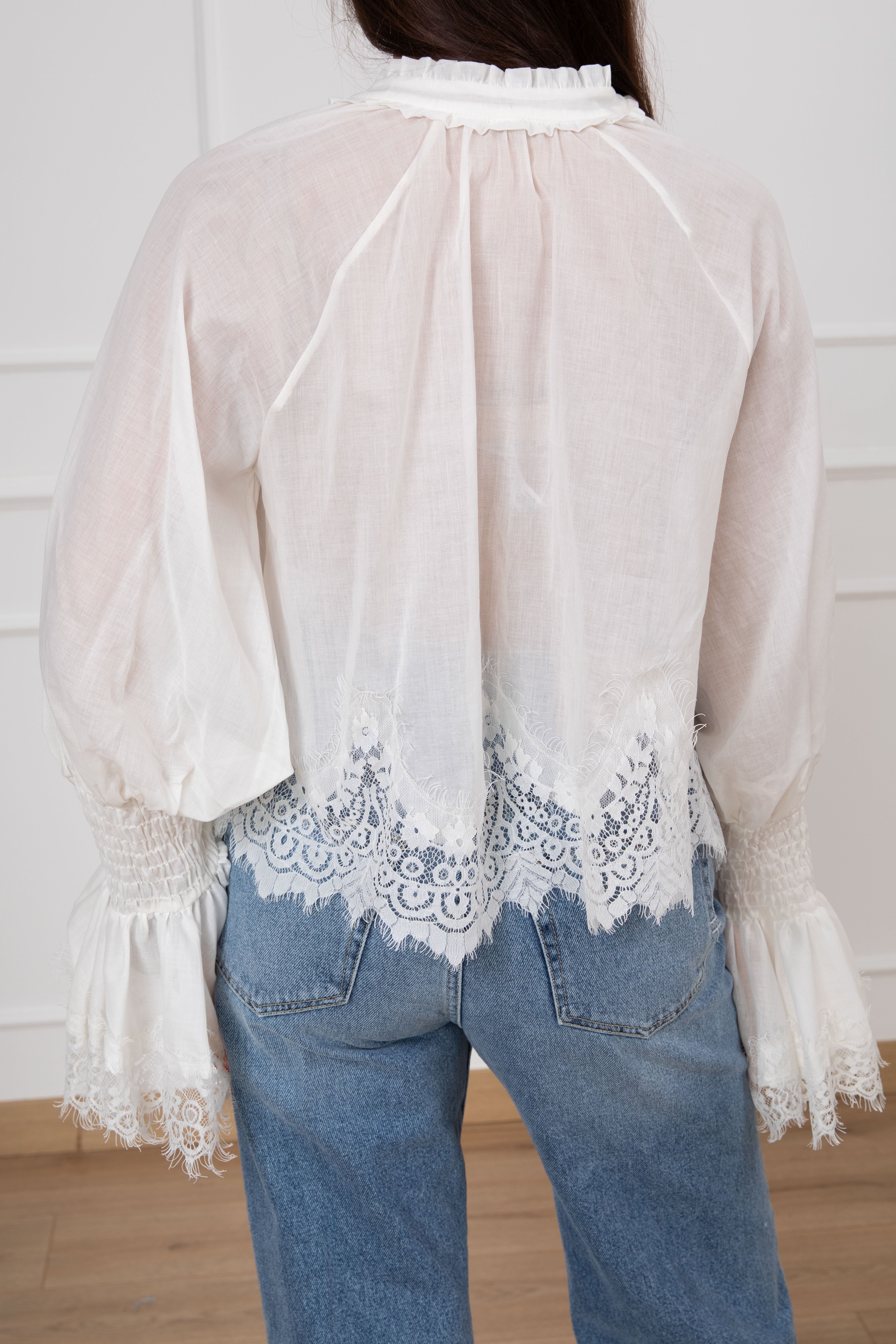 Blusa con fondo in pizzo Tensione IN