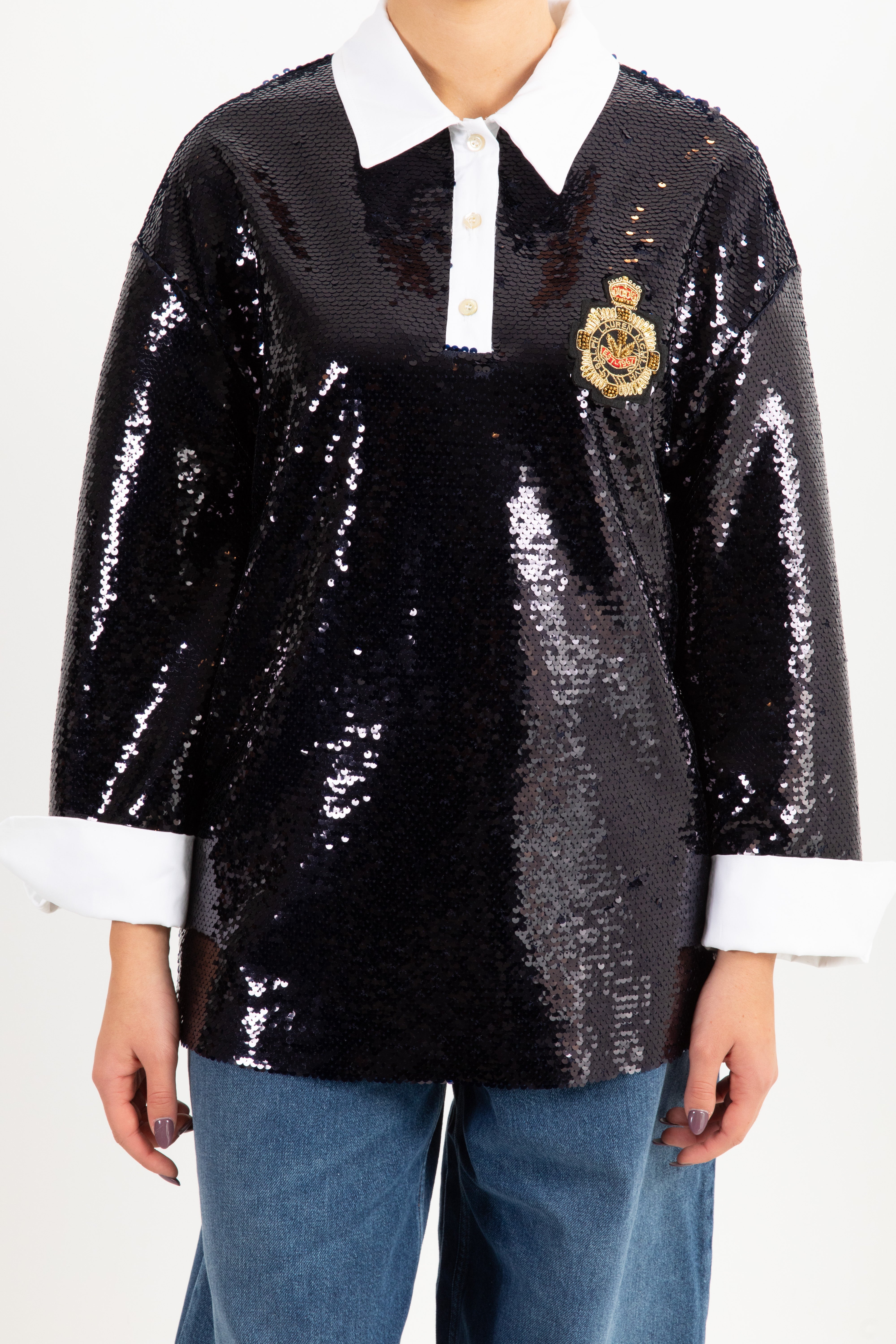 Blusa a polo con paillettes e patch Tensione IN