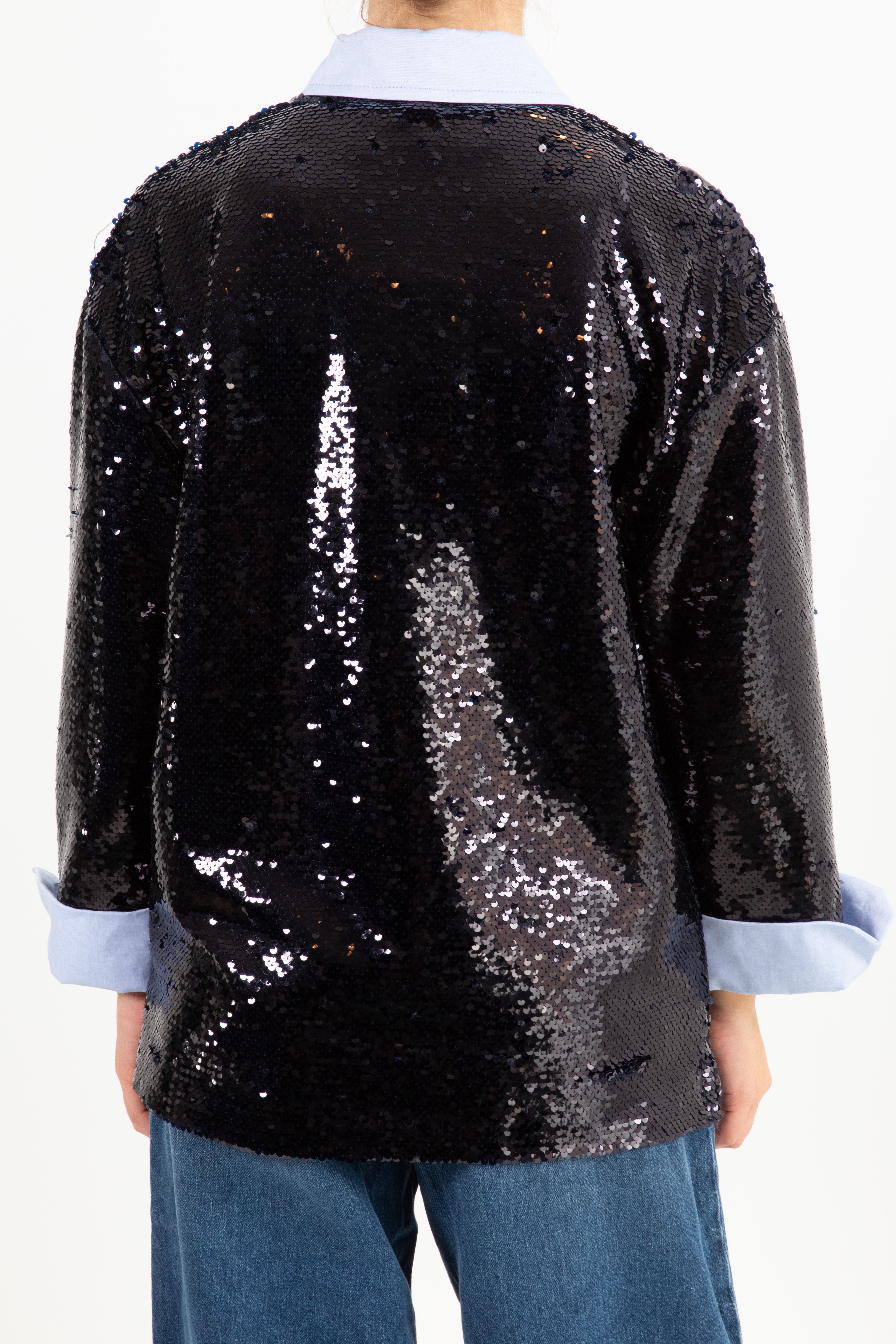 Blusa a polo con paillettes e patch Tensione IN