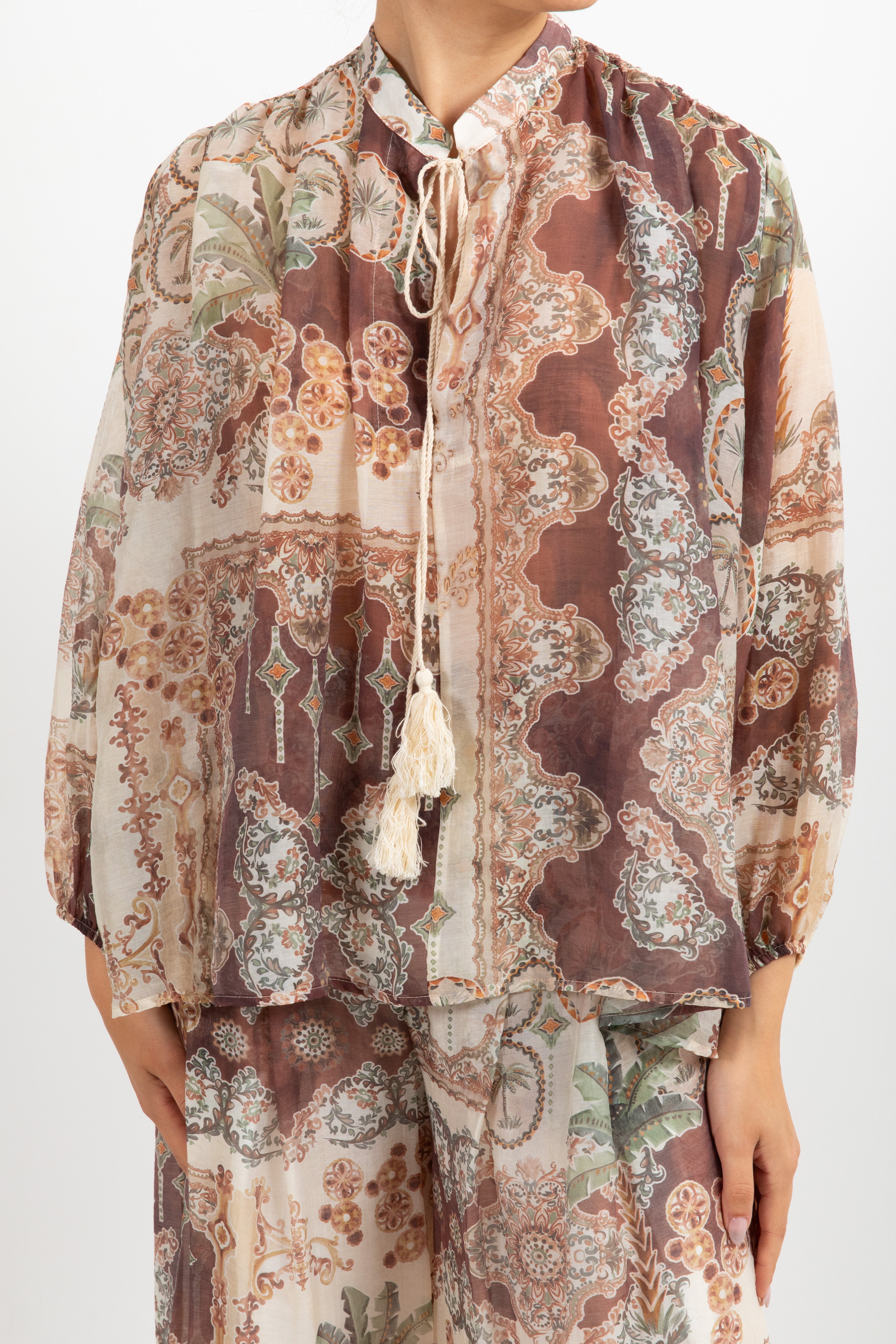 Blusa con nappine fantasia palme ViCOLO