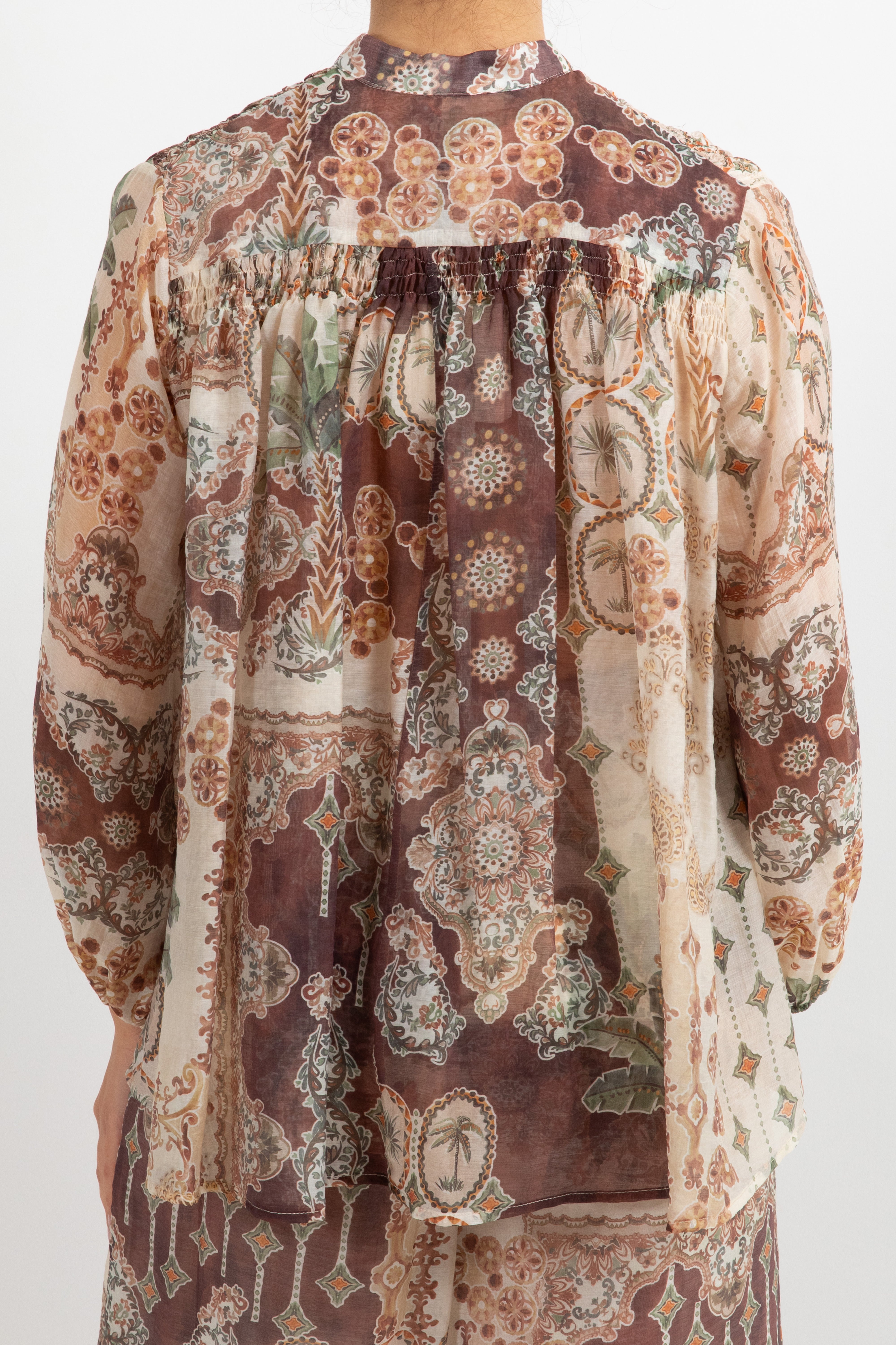 Blusa con nappine fantasia palme ViCOLO