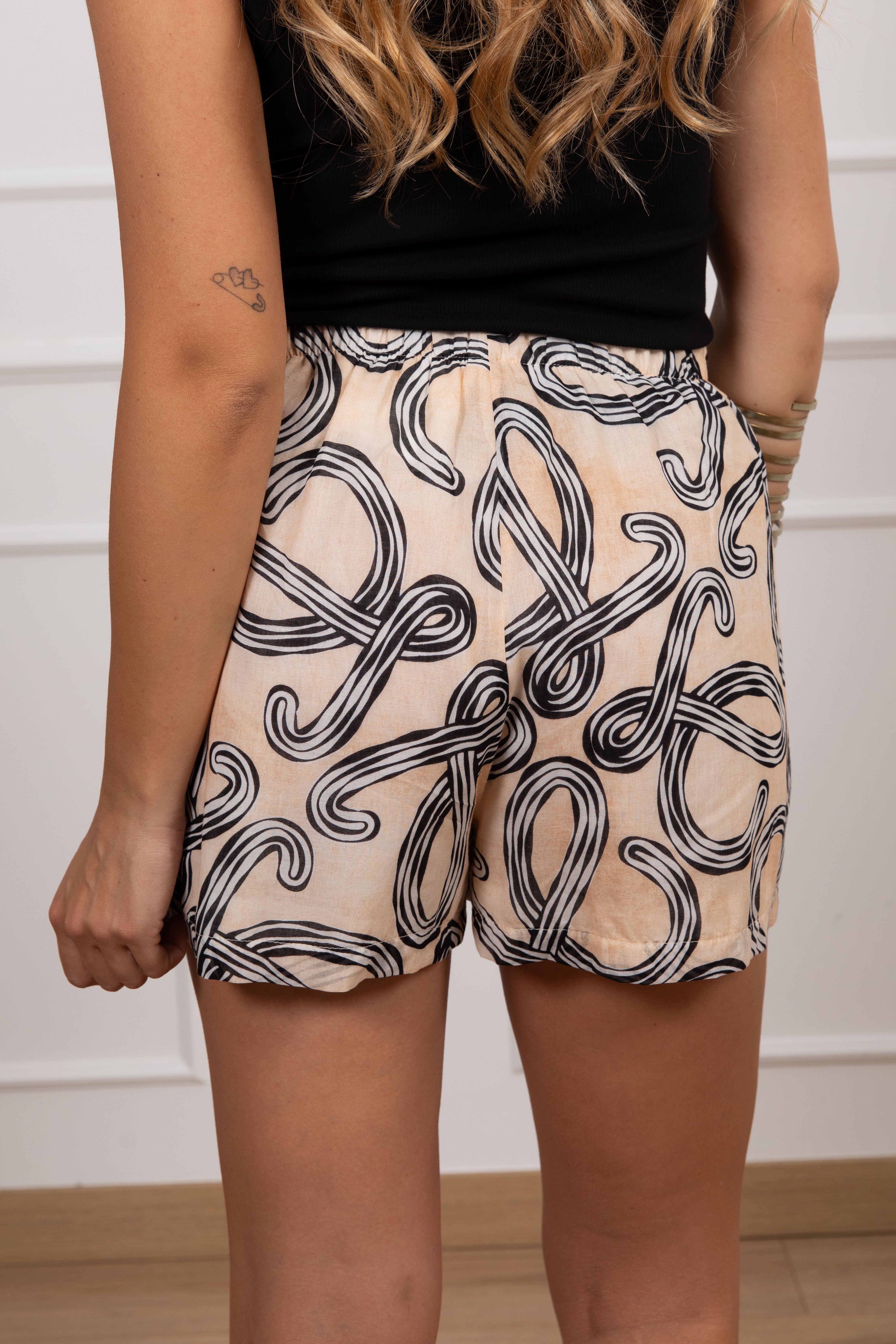 Shorts stampa anagram Tensione IN