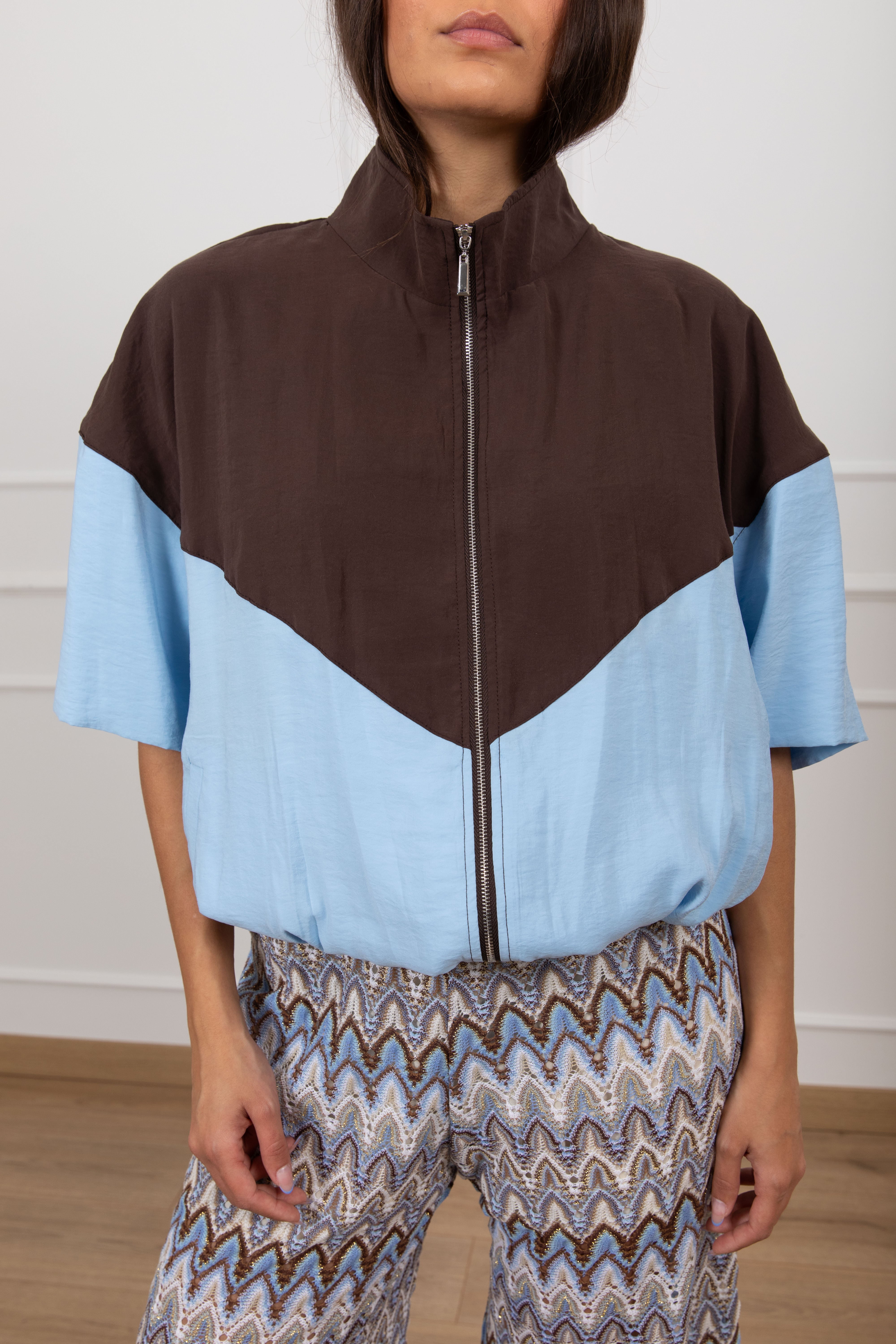 Bomber manica corta bi-color in cupro Tensione IN