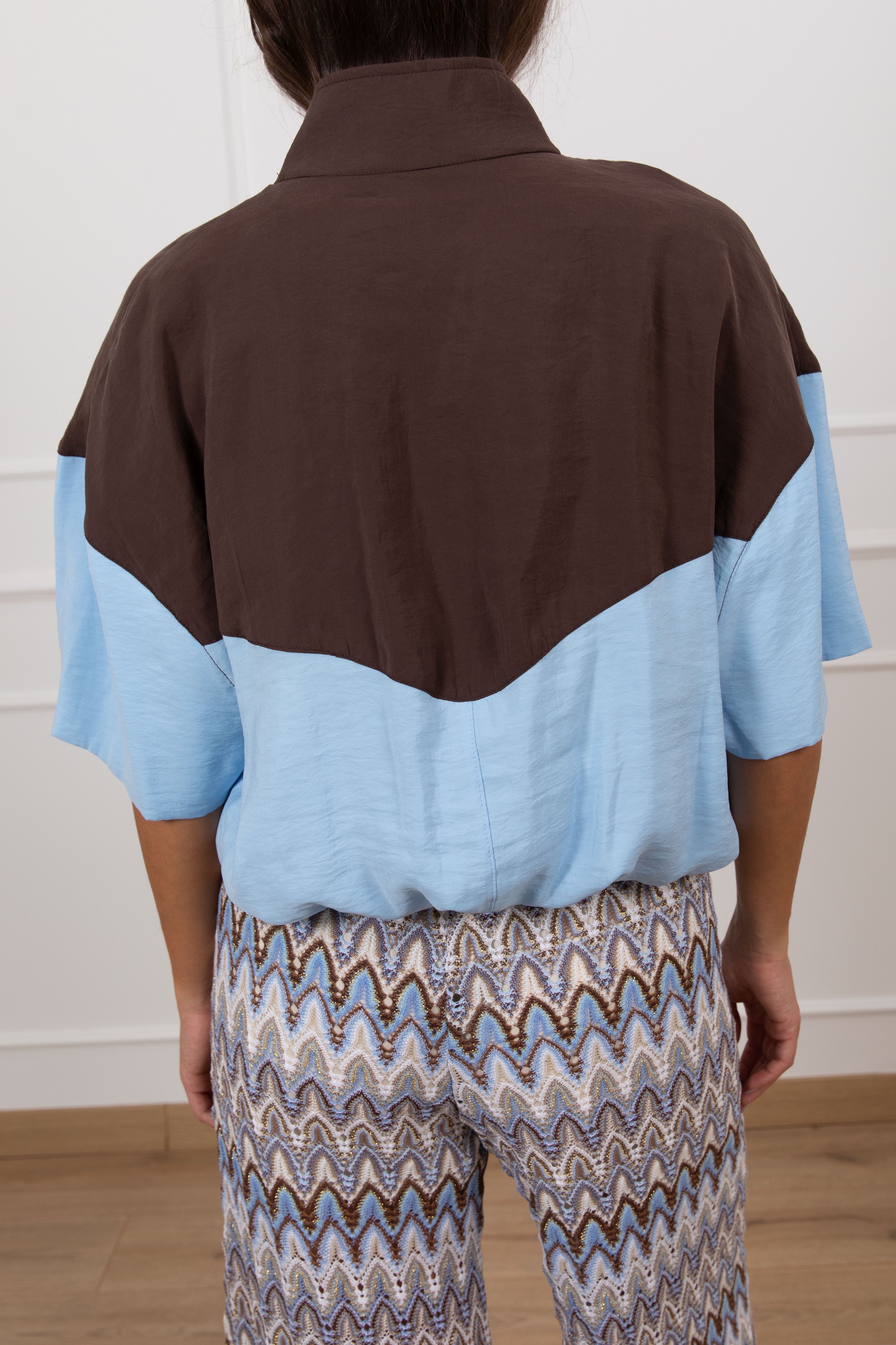 Bomber manica corta bi-color in cupro Tensione IN