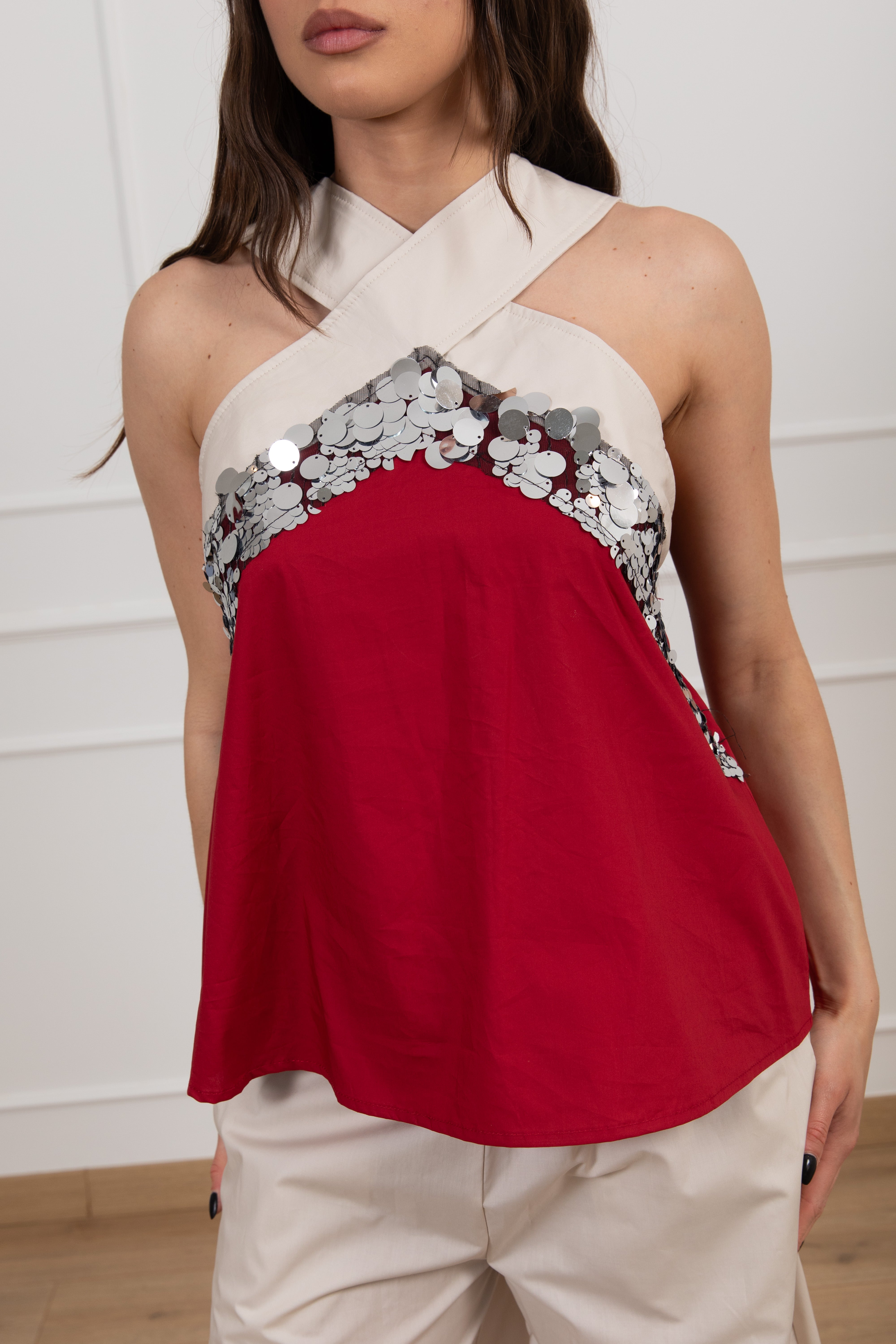 Top ad incrocio con inserto paillettes Motel