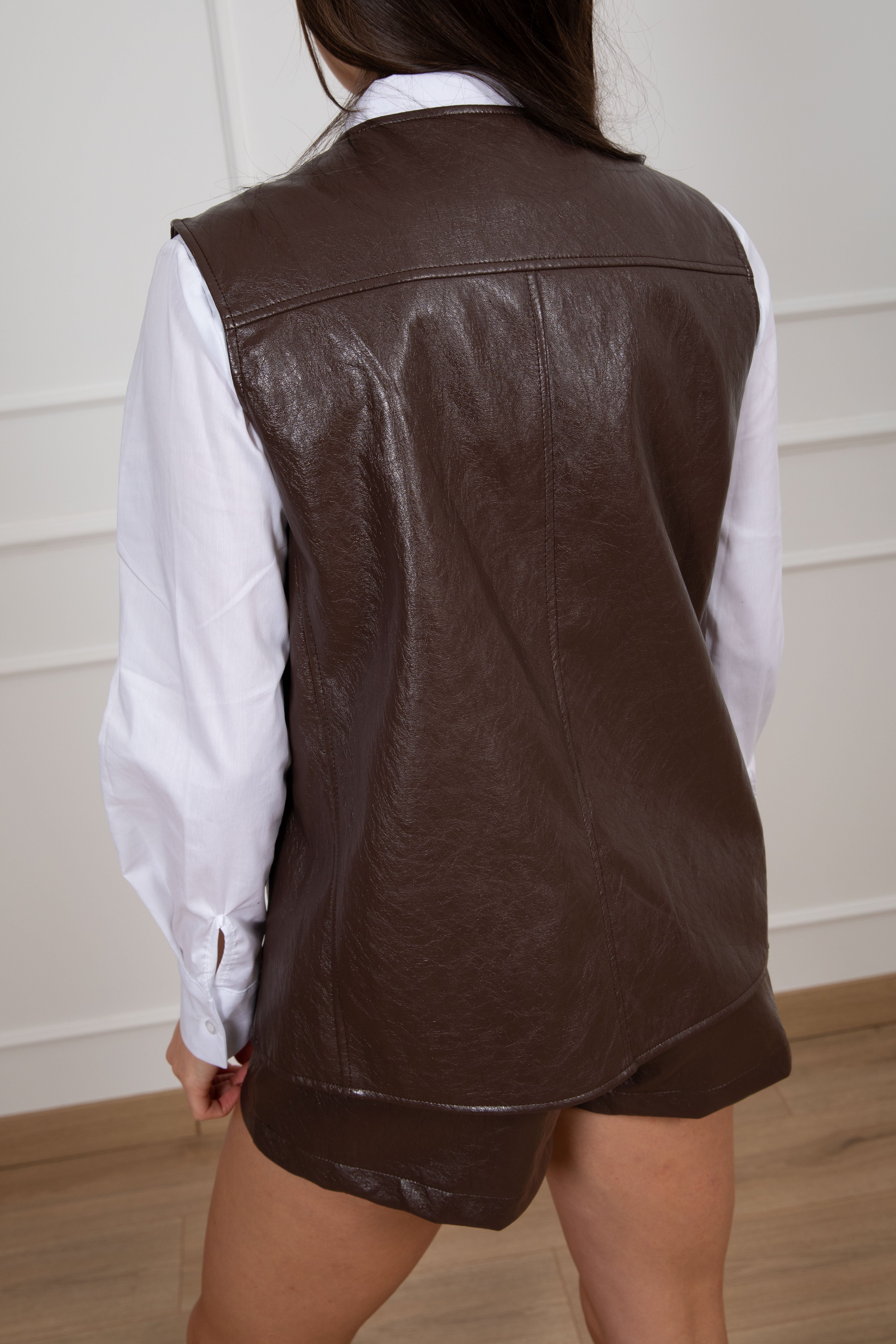 Gilet in eco-pelle con tasche ViCOLO
