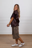 Chiodo smanicato in eco-pelle lucida variante bordeaux Haveone