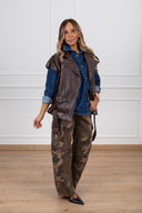Chiodo smanicato in eco-pelle lucida variante moro Haveone