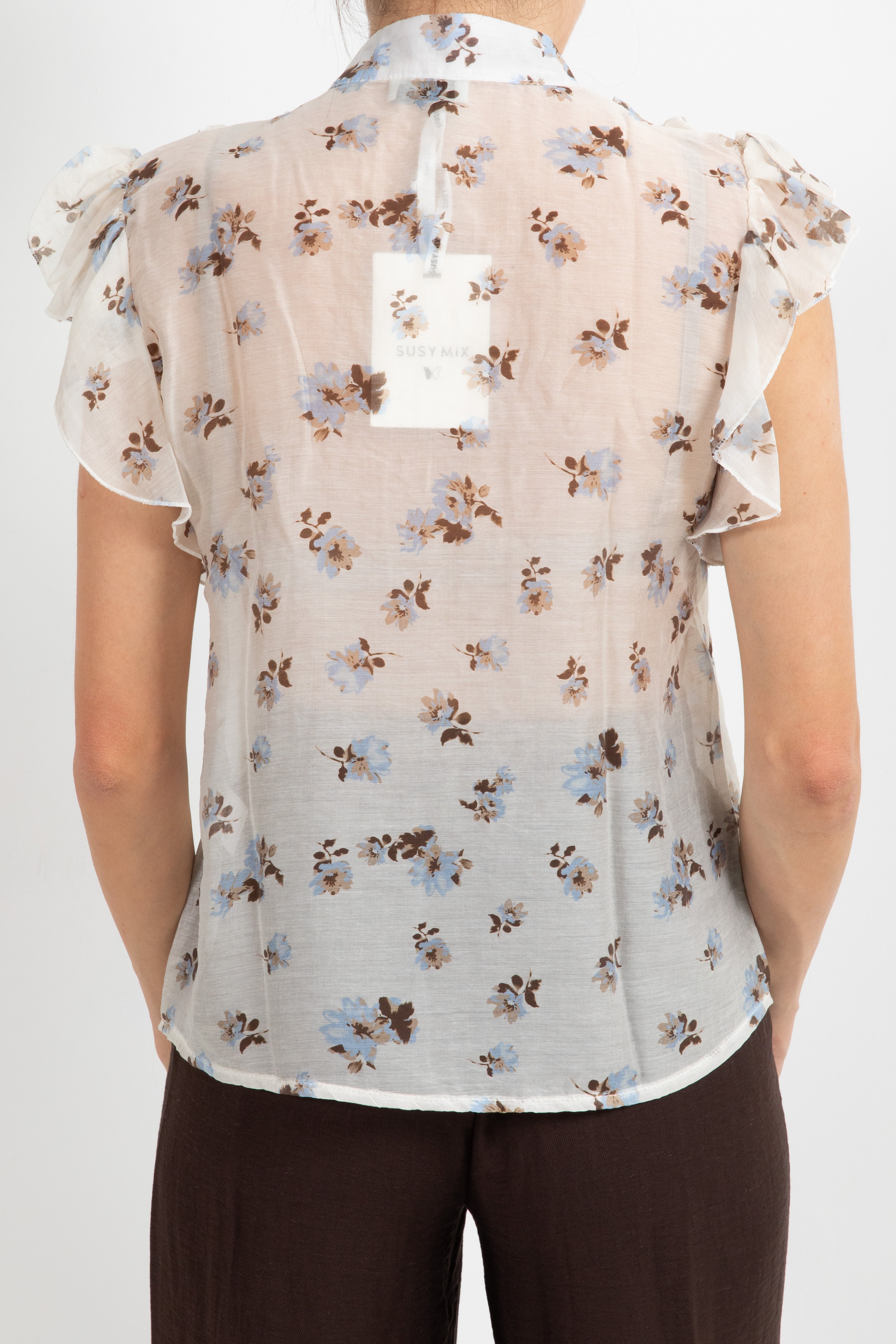 Camicia smanicata con rouches fantasia flowers celeste Susy Mix