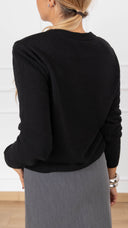 Pull girocollo con spallina imbottita variante nero Tensione IN