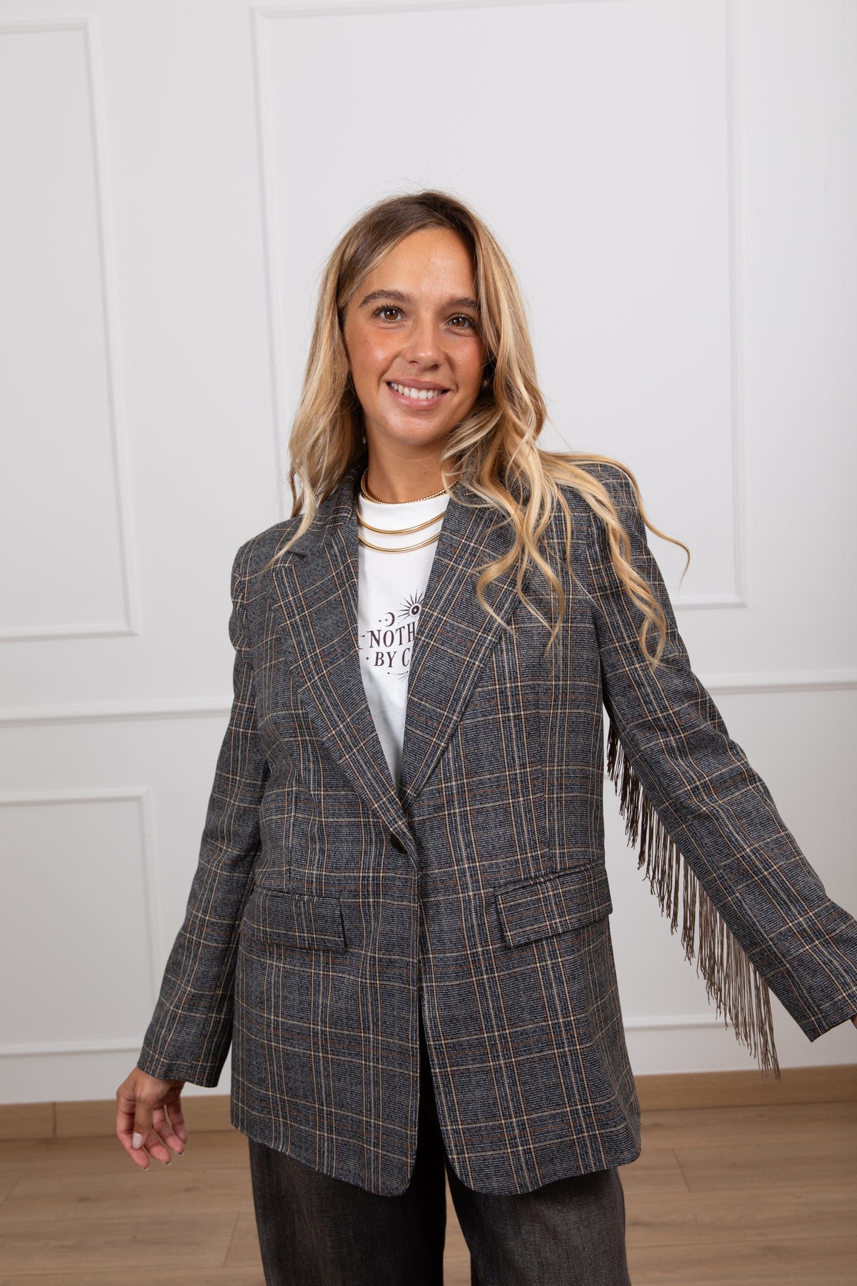 Giacca check con frange beige sul retro Tensione IN