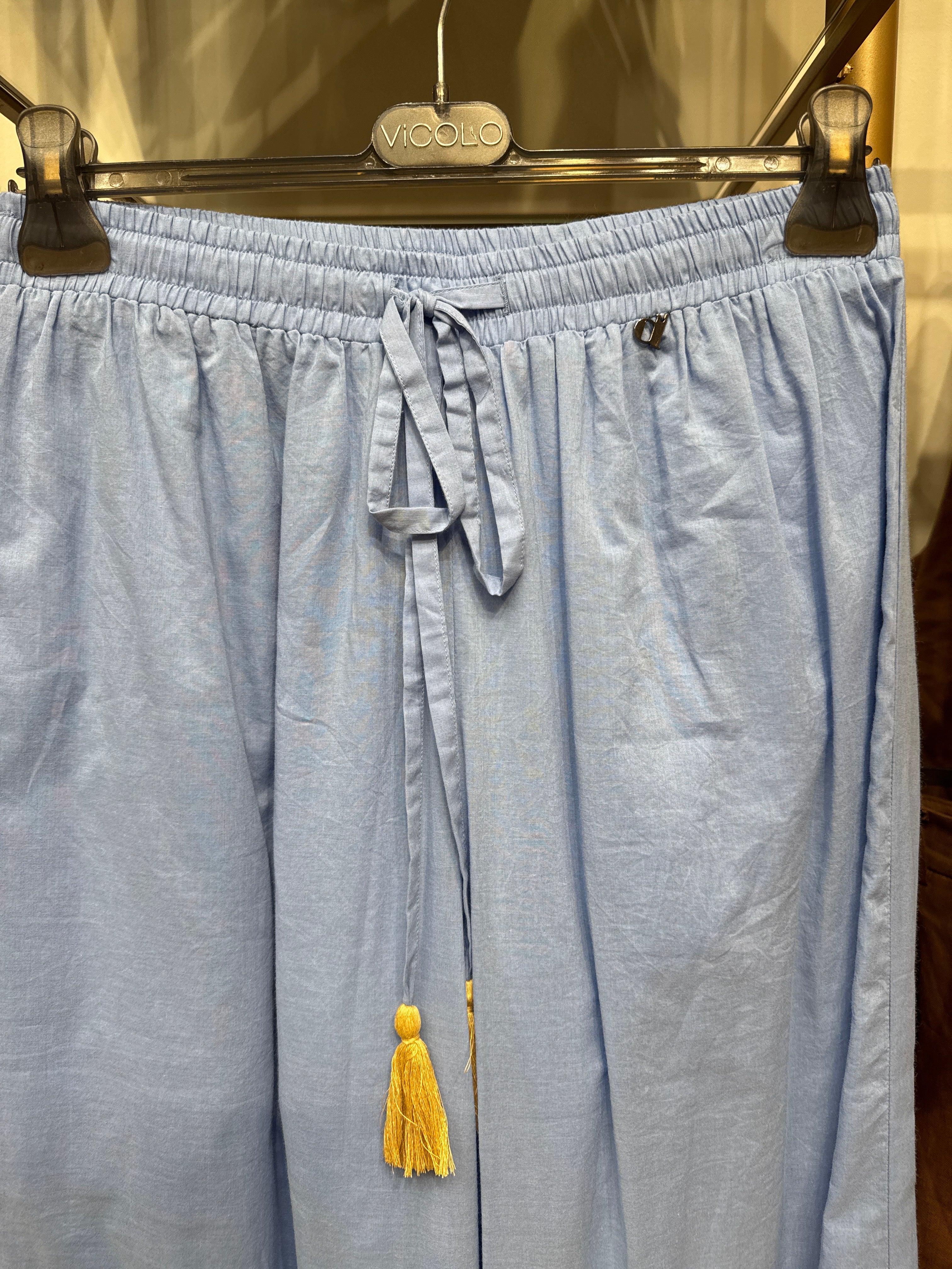 Pantalone in cotone con nappine e ricamo floreale Dixie